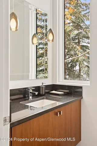 a view of a sink and a mirror