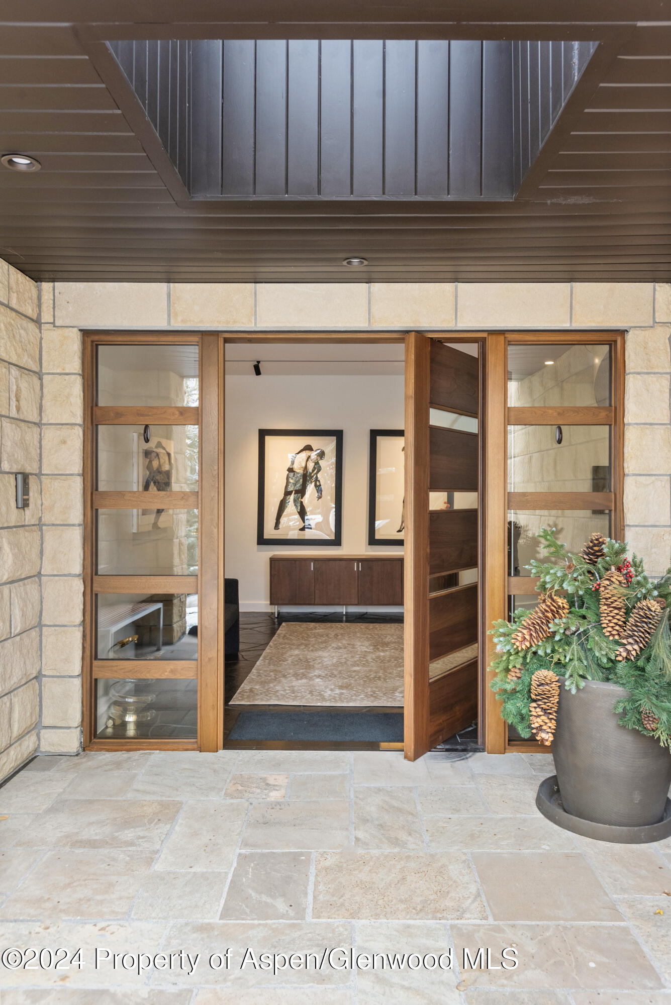 189 Aspen Way Snowmass Village, CO 81615 - Photo 30 of 44 a view of an entryway with wooden door