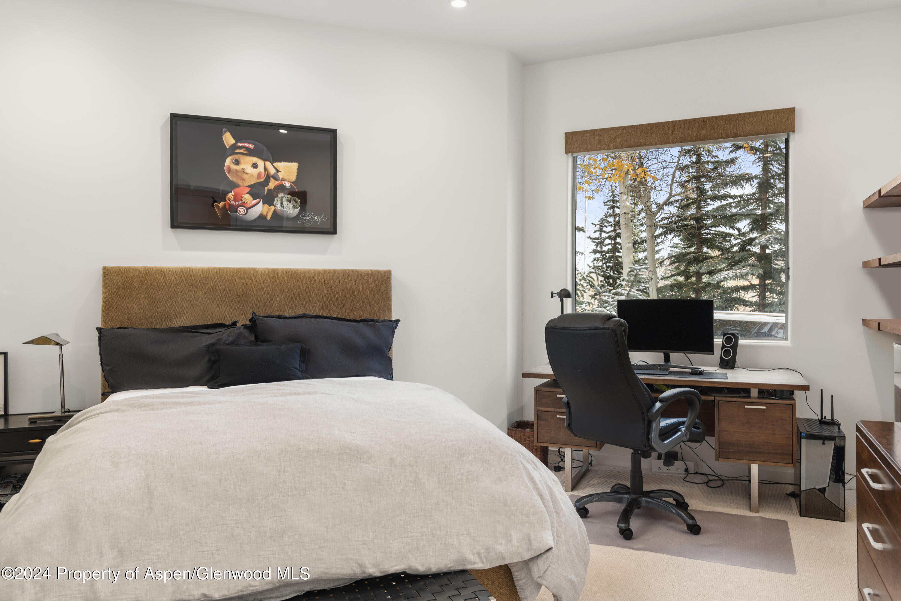 189 Aspen Way Snowmass Village, CO 81615 - Photo 39 of 44 a bedroom with a bed and a desk