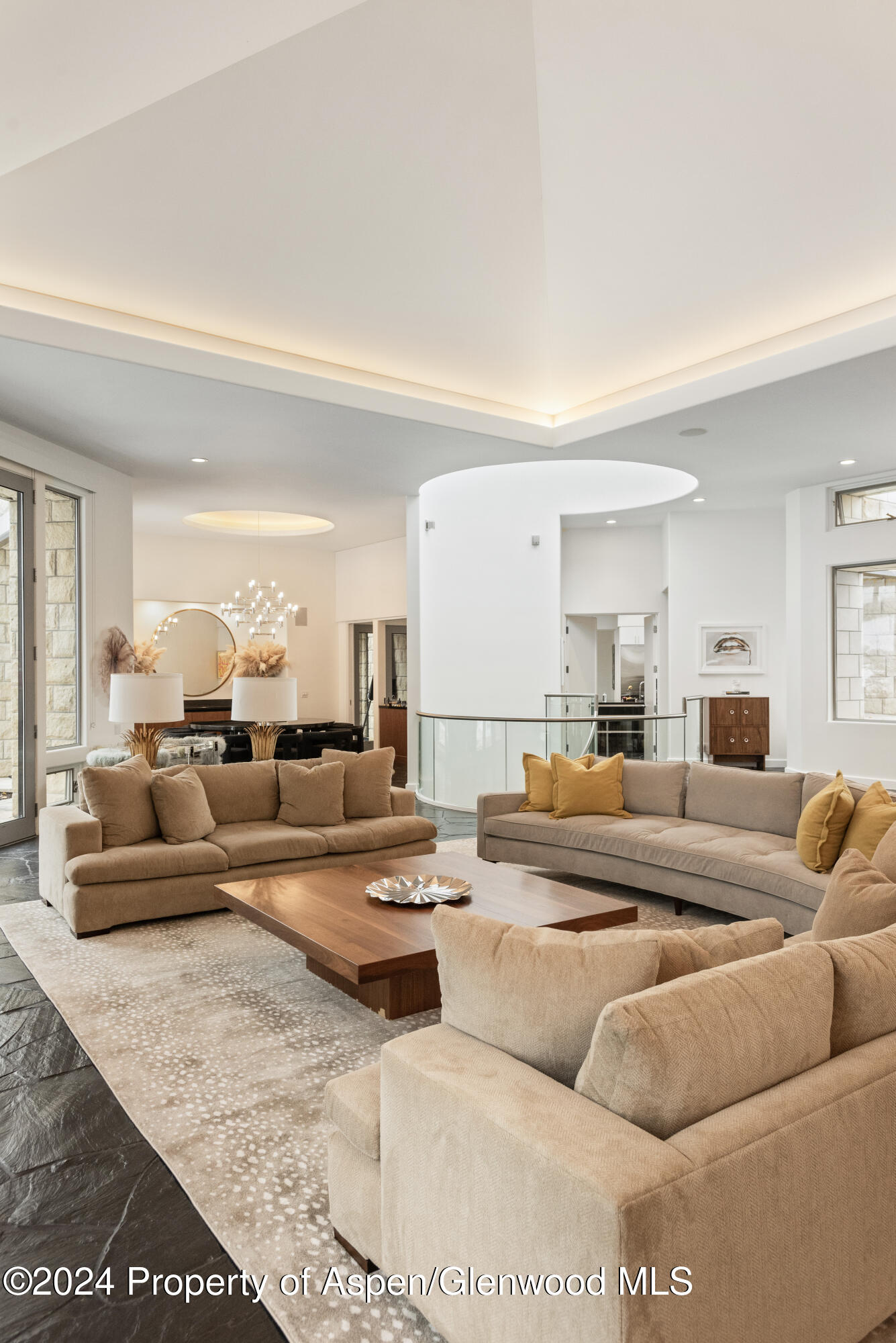 189 Aspen Way Snowmass Village, CO 81615 - Photo 8 of 44 a living room with furniture and a large mirror