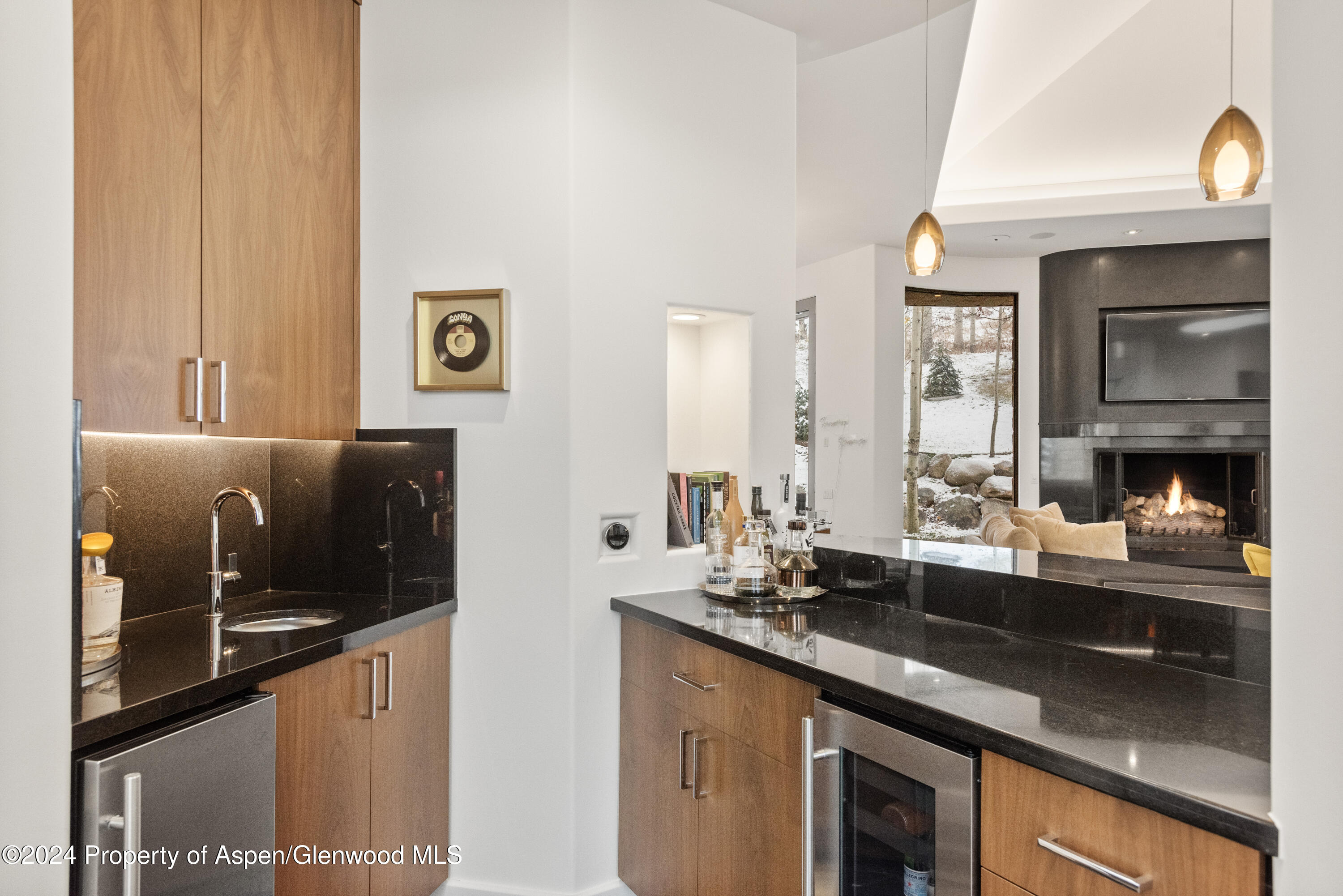 189 Aspen Way Snowmass Village, CO 81615 - Photo 10 of 44 a kitchen with a sink and a refrigerator