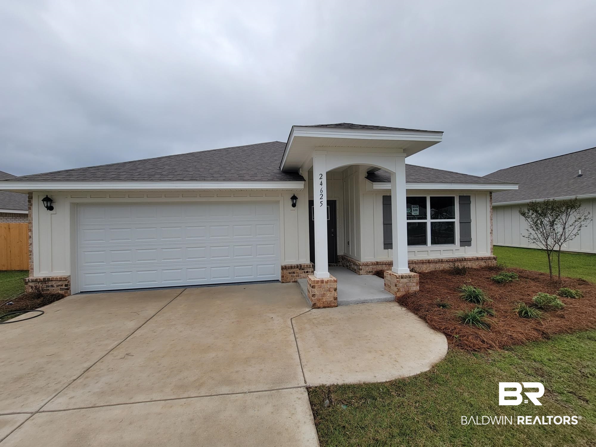 24625 Ponder Loop Loxley, AL 36551 - Photo 16 of 30 Single story home featuring a garage and a front lawn