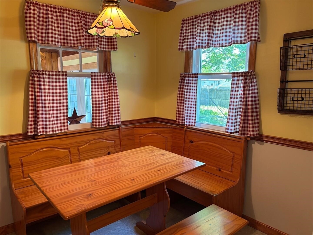 65 Brookside Circle Springfield, MA 01129 - Photo 12 of 25 a view of a balcony with a table and chairs