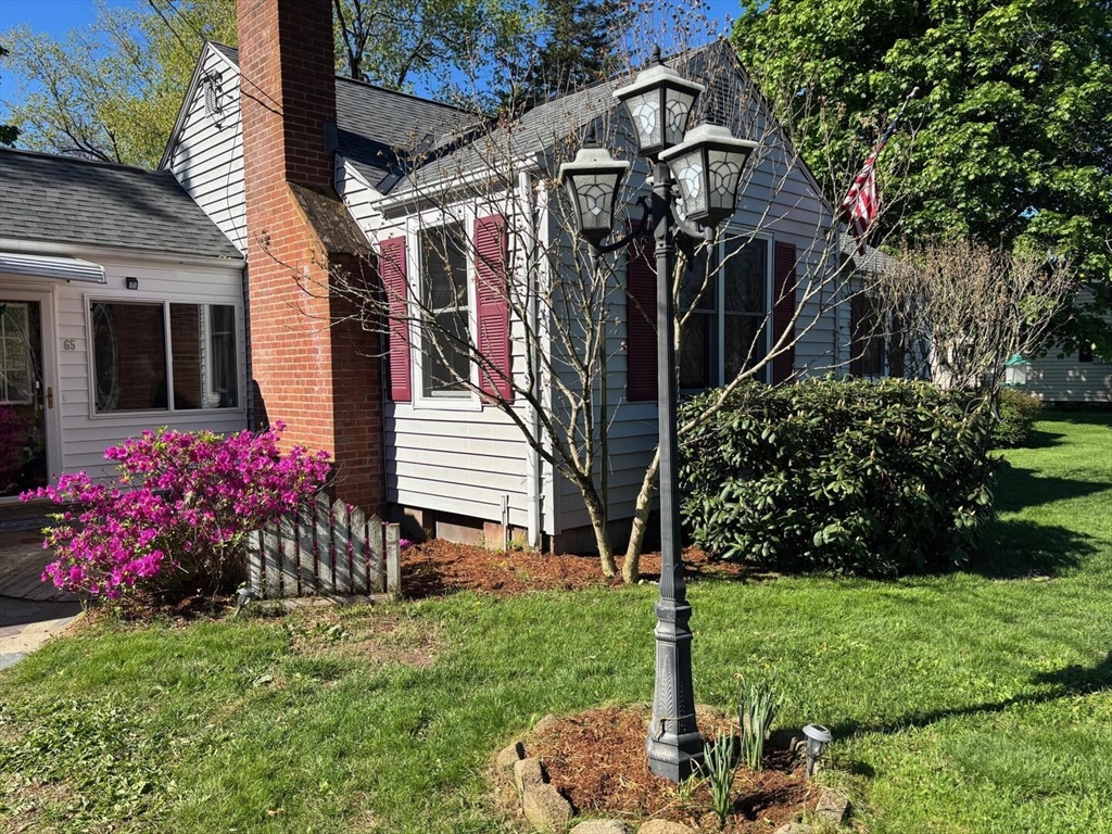 65 Brookside Circle Springfield, MA 01129 - Photo 2 of 25 a view of a house with a yard