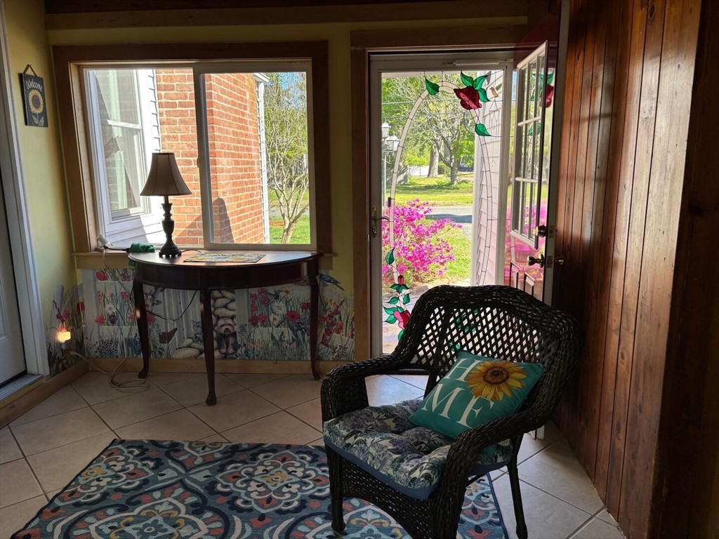 65 Brookside Circle Springfield, MA 01129 - Photo 6 of 25 a outdoor living space with furniture and a rug