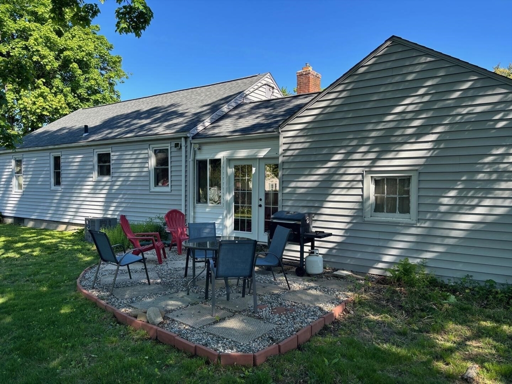 65 Brookside Circle Springfield, MA 01129 - Photo 8 of 25 a view of a house with backyard porch and sitting area