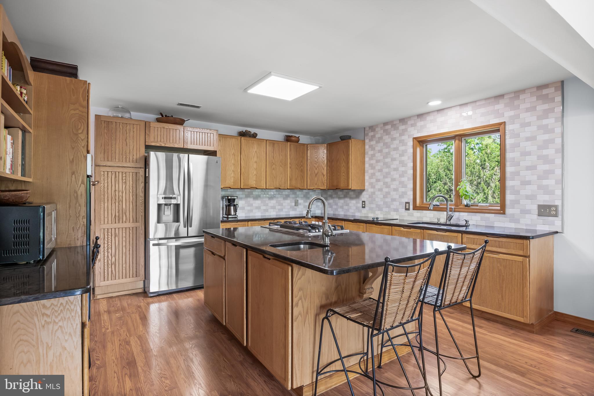 10 Marriott Drive Lumberton, NJ 08048 - Photo 14 of 60 a kitchen with stainless steel appliances granite countertop a stove a sink refrigerator and a refrigerator