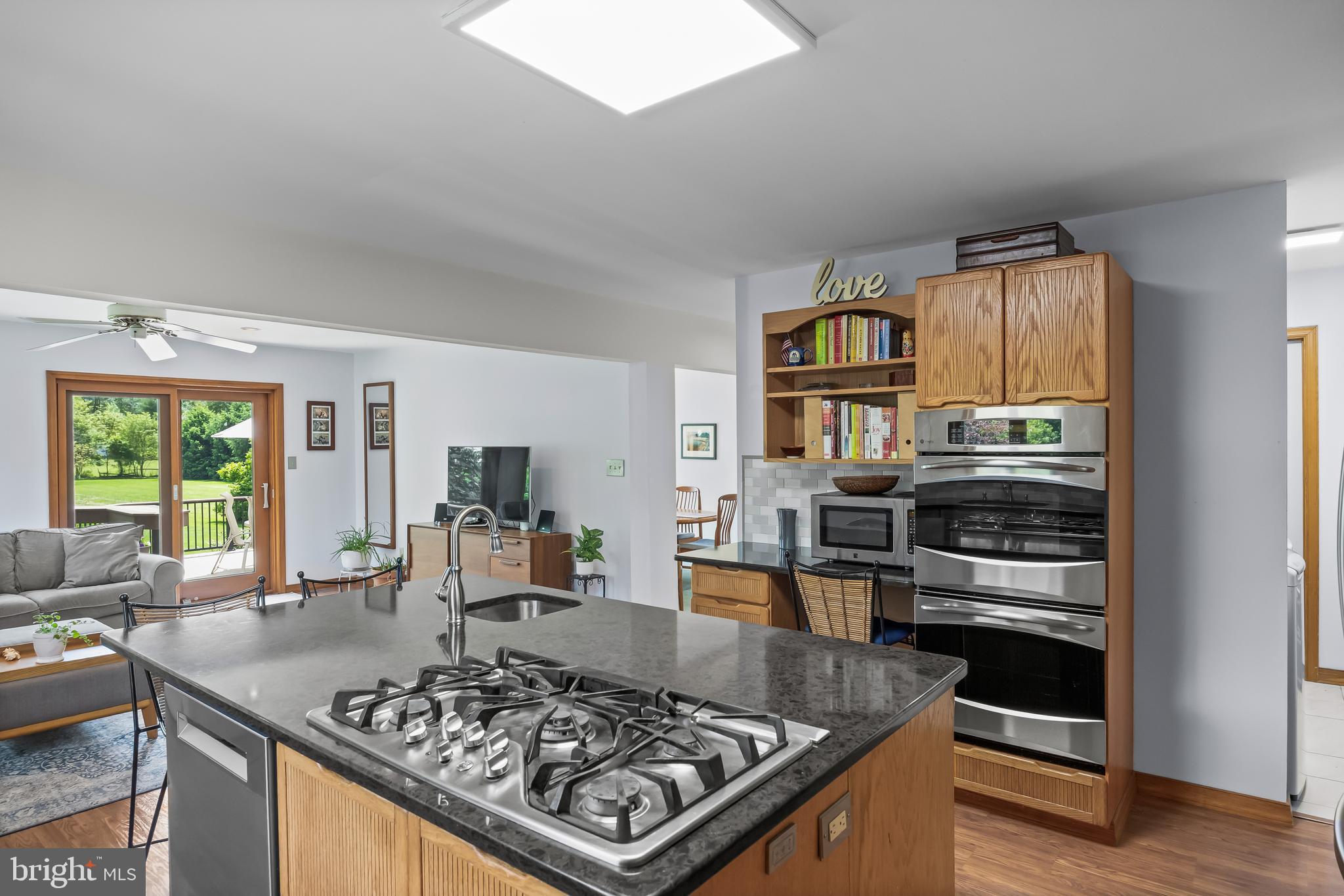 10 Marriott Drive Lumberton, NJ 08048 - Photo 18 of 60 a kitchen with stainless steel appliances granite countertop a stove and a refrigerator