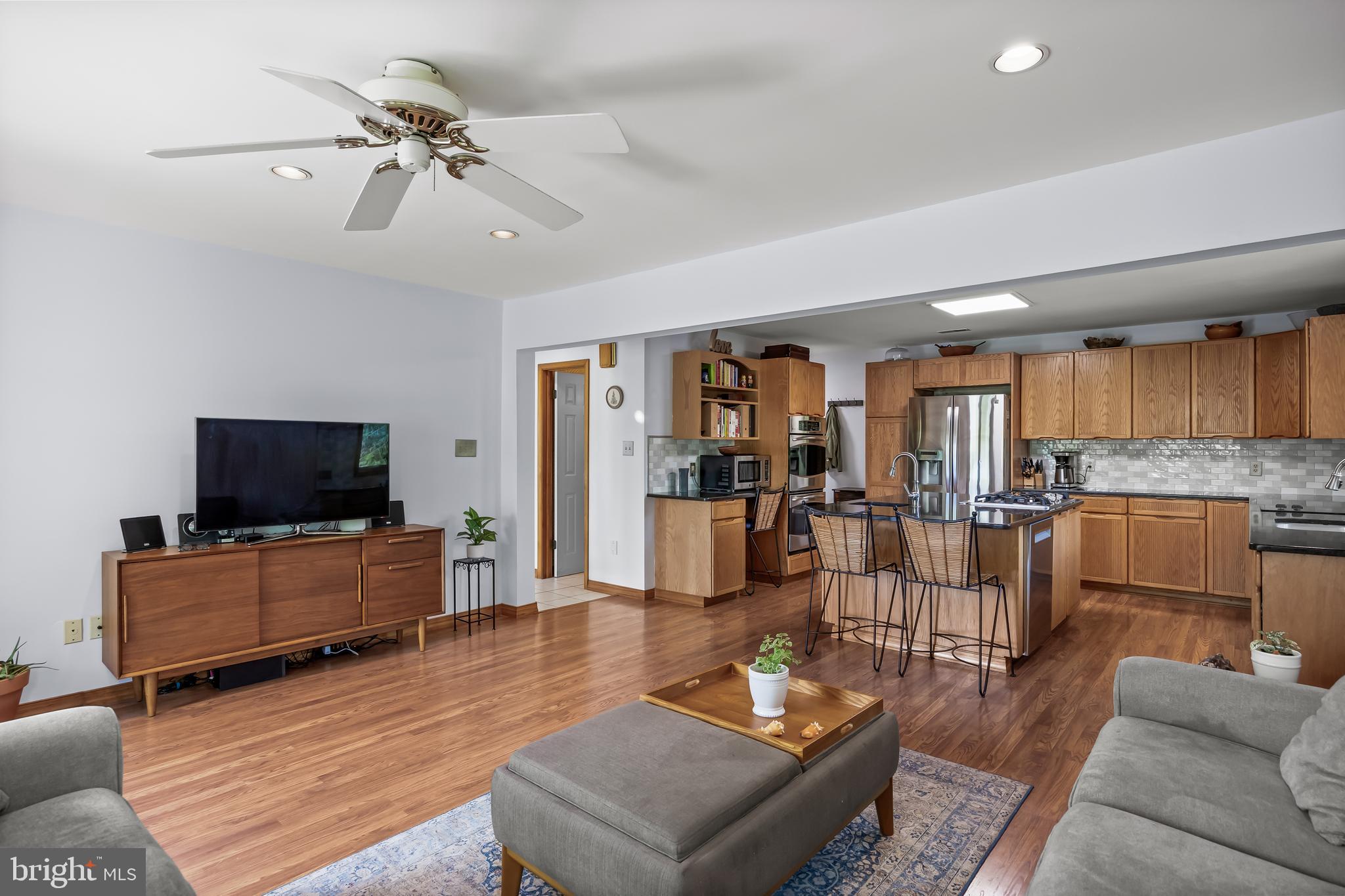 10 Marriott Drive Lumberton, NJ 08048 - Photo 22 of 60 a living room with furniture and a flat screen tv