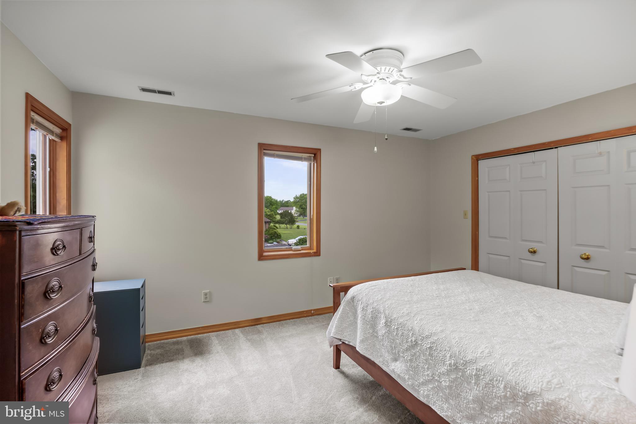 10 Marriott Drive Lumberton, NJ 08048 - Photo 39 of 60 a bedroom with a large bed and a chandelier
