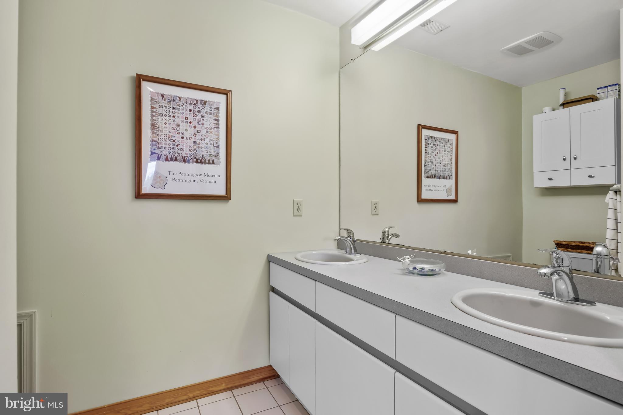 10 Marriott Drive Lumberton, NJ 08048 - Photo 40 of 60 a bathroom with a sink and a mirror