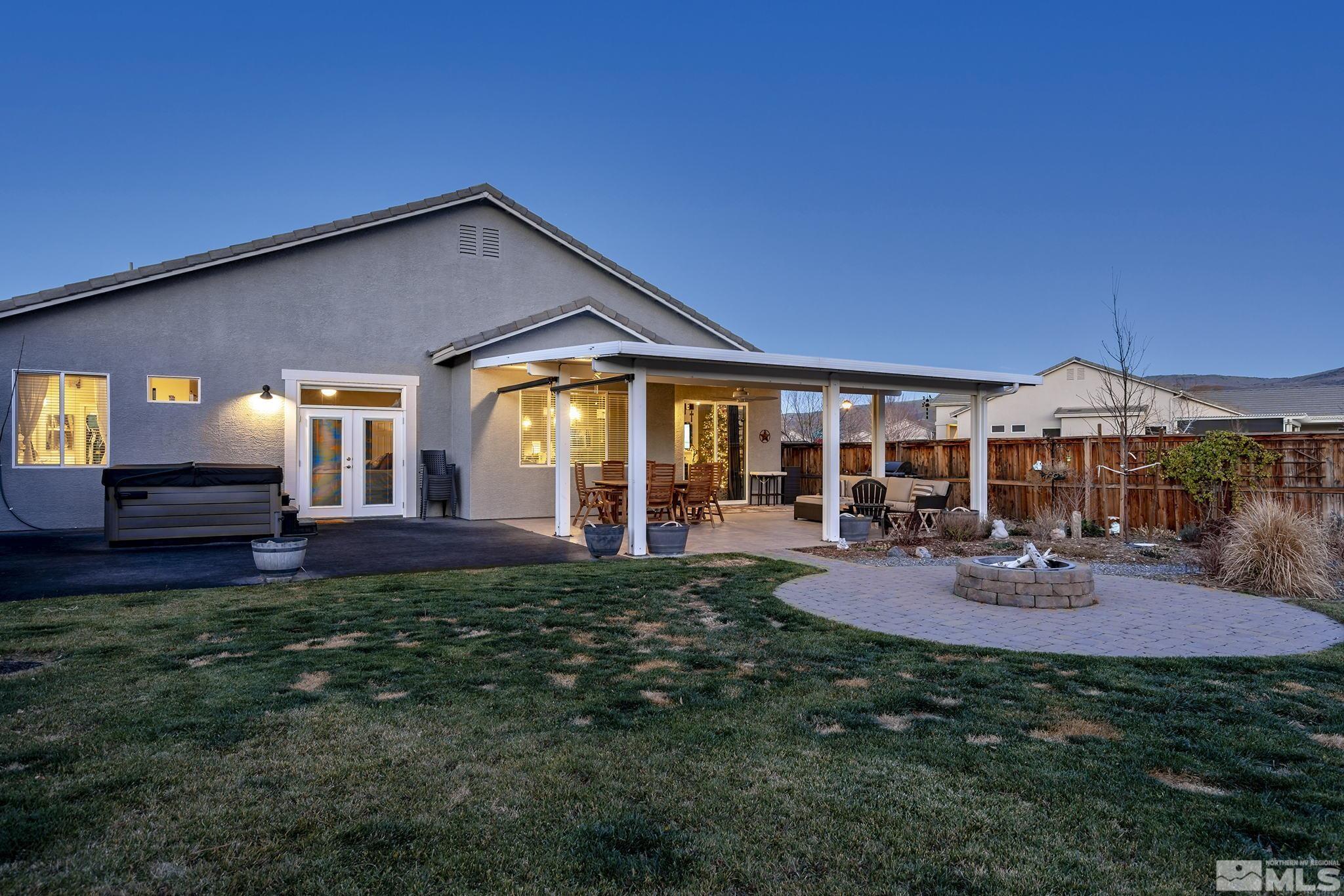 1680 Ghettis Way Reno, NV 89521 - Photo 28 of 35 a view of a house with backyard porch and garden