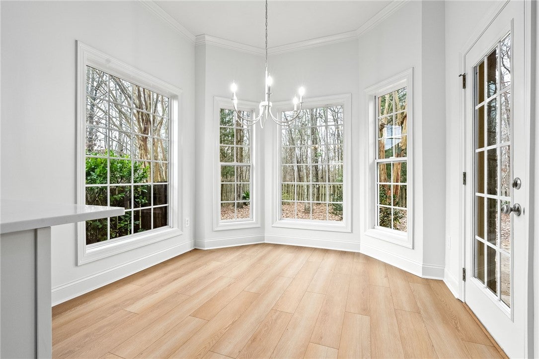 1756 Vfw Road Auburn, AL 36830 - Photo 9 of 26 The breakfast room is wrapped in windows and flooded with natural light.
