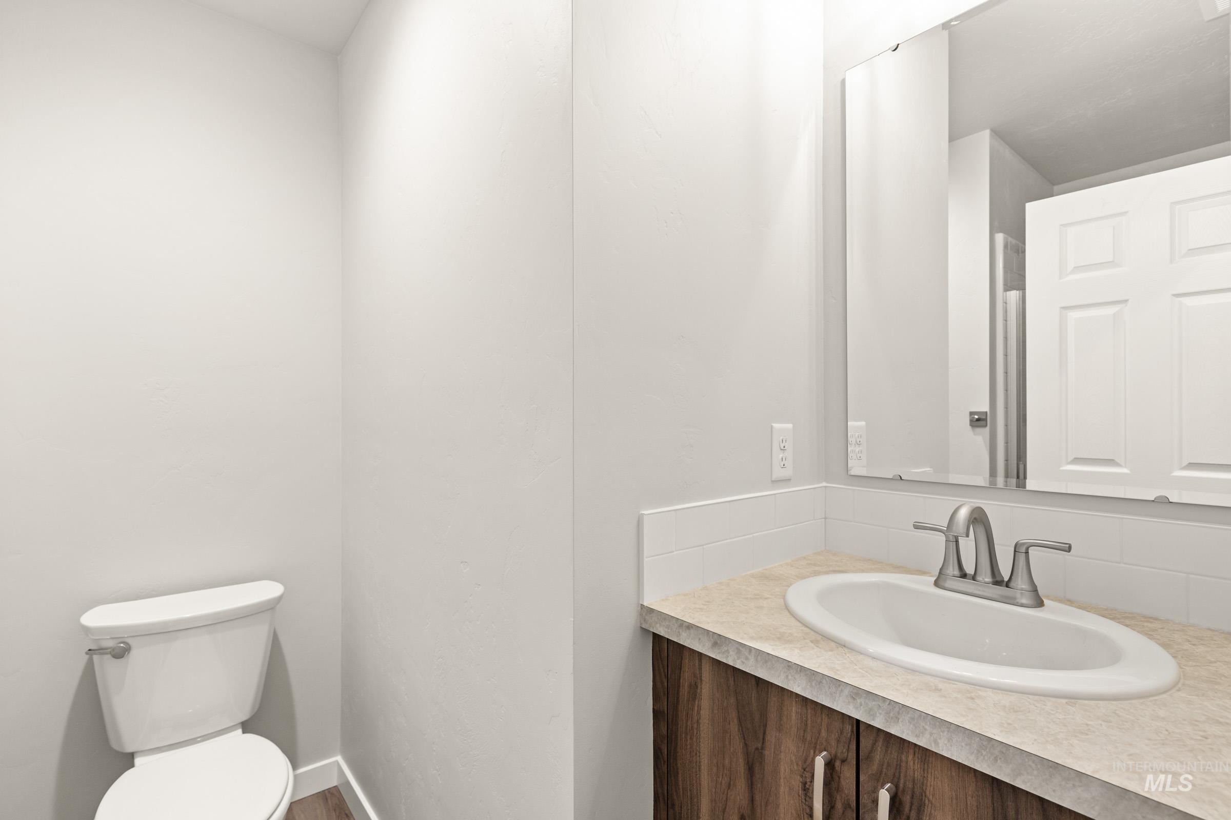 13704 Redway Court Caldwell, ID 83607 - Photo 12 of 23 Bathroom with toilet and vanity