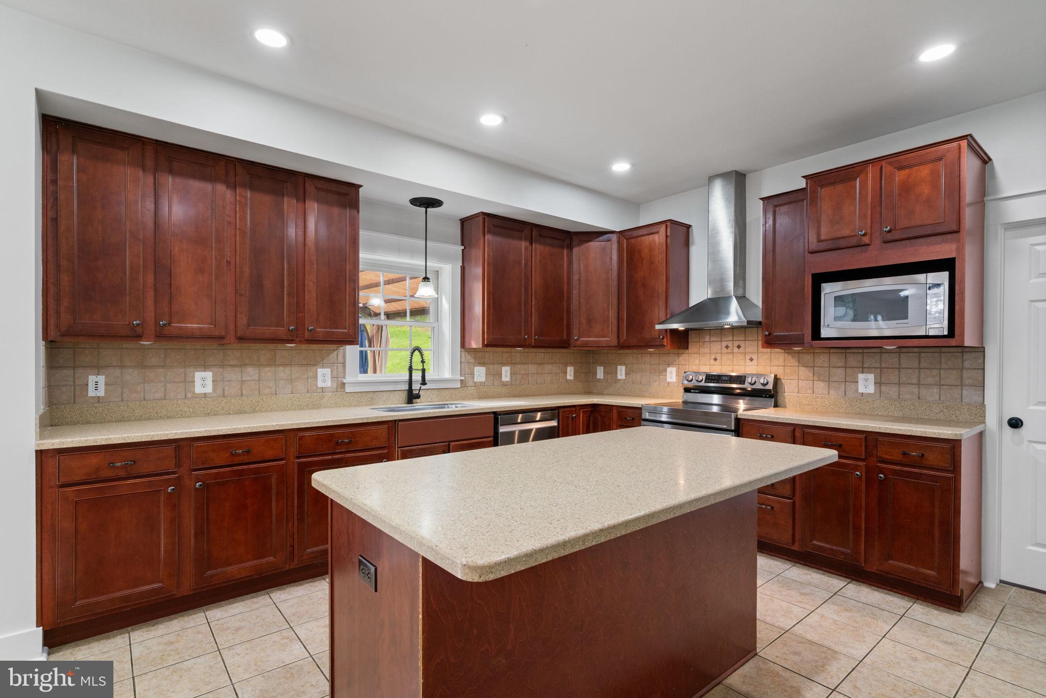 208 Markham Farm Road Front Royal, VA 22630 - Photo 18 of 85 Kitchen with large Island with hidden trash can