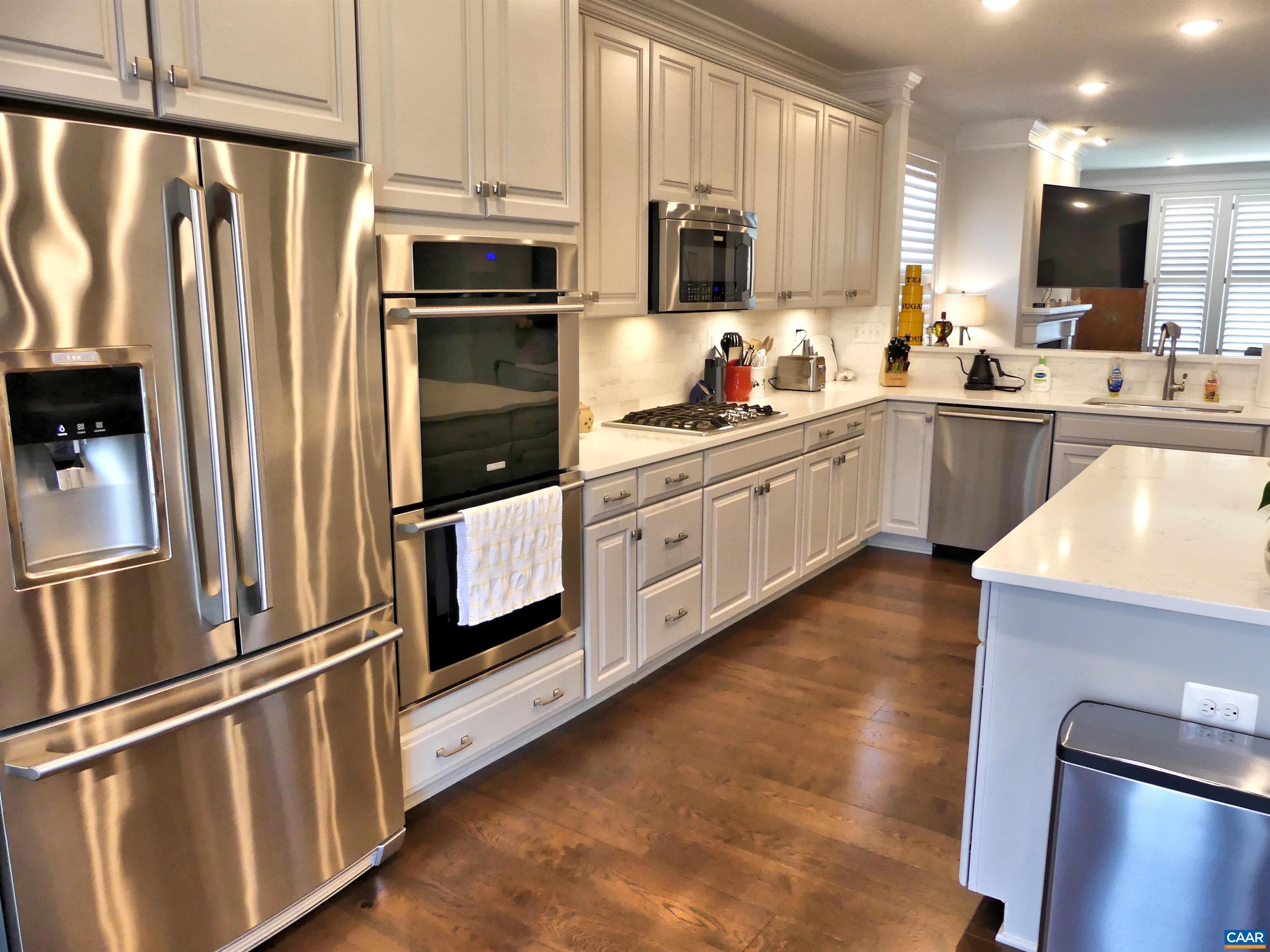 1318 Free State Drive Charlottesville, VA 22901 - Photo 12 of 46 a kitchen with stainless steel appliances a refrigerator sink and microwave