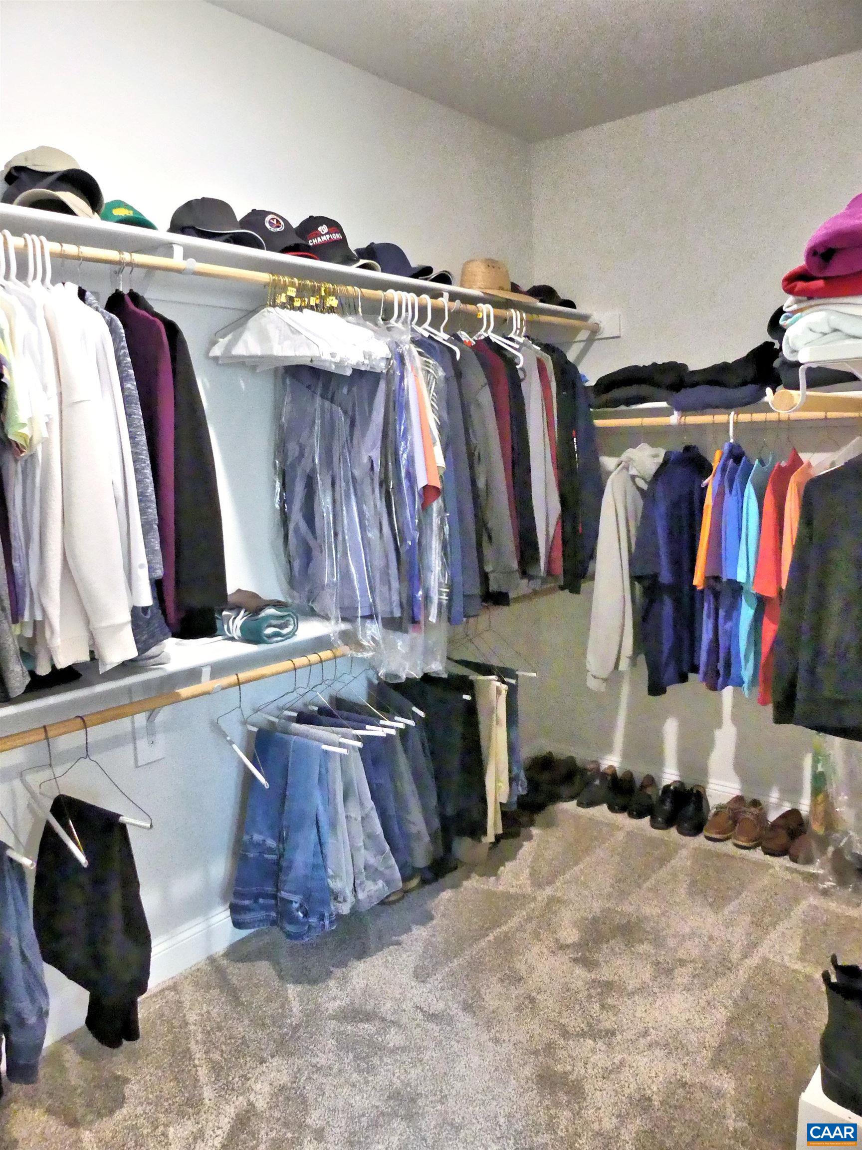 1318 Free State Drive Charlottesville, VA 22901 - Photo 26 of 46 a view of walk in closet with clothes and shoes