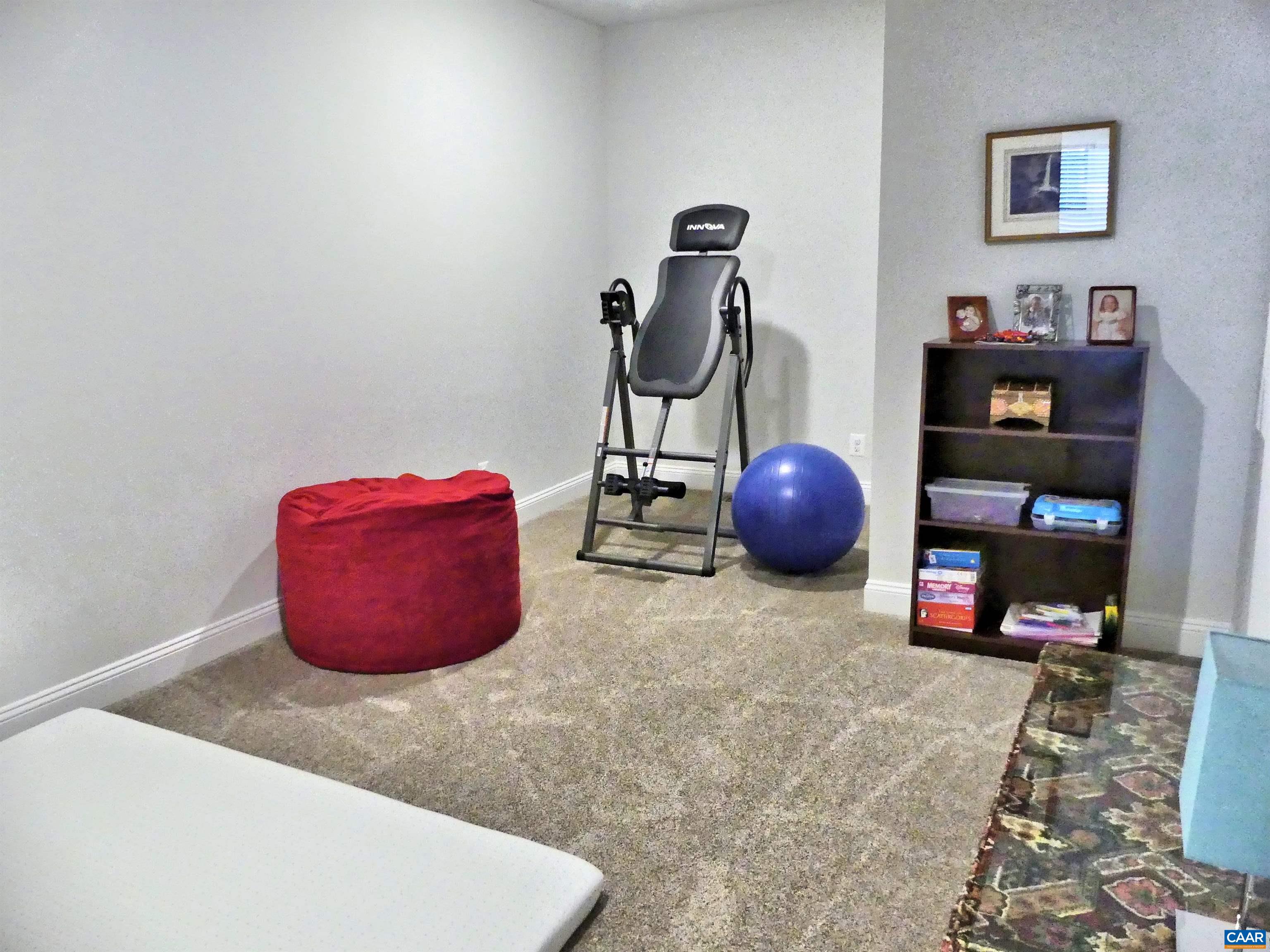 1318 Free State Drive Charlottesville, VA 22901 - Photo 33 of 46 a room with wooden floor and shoes