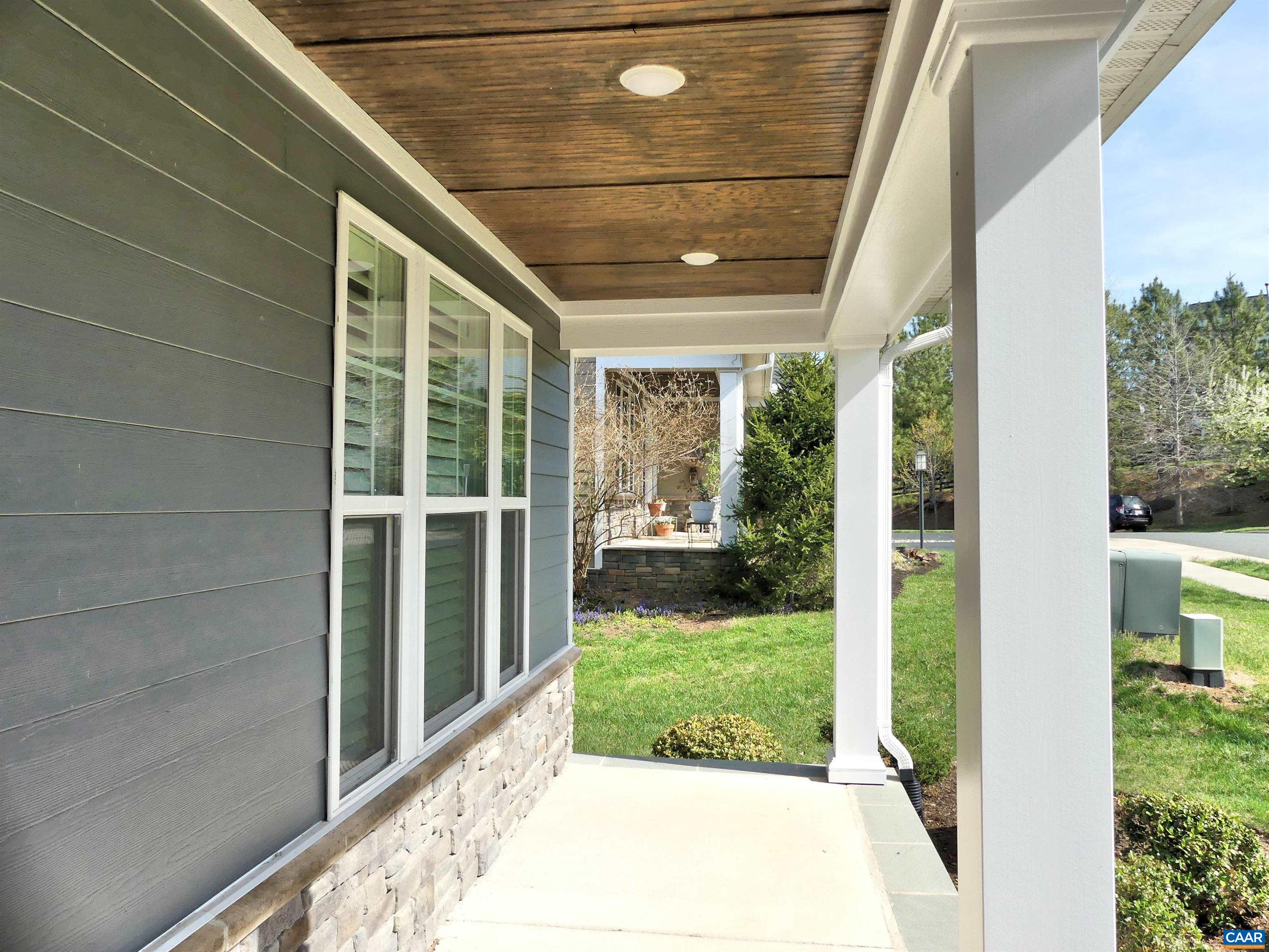 1318 Free State Drive Charlottesville, VA 22901 - Photo 4 of 46 a view of a porch with a floor to ceiling window and garden