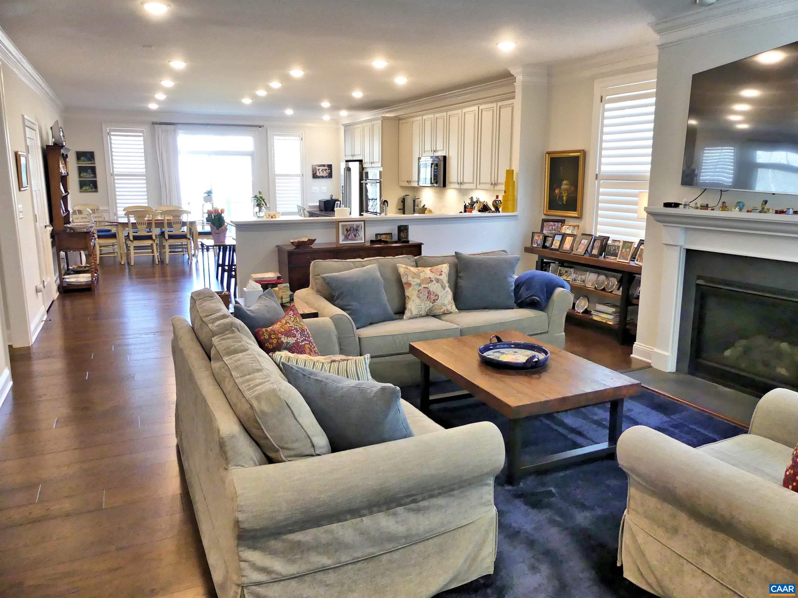 1318 Free State Drive Charlottesville, VA 22901 - Photo 6 of 46 a living room with furniture kitchen view and a fireplace