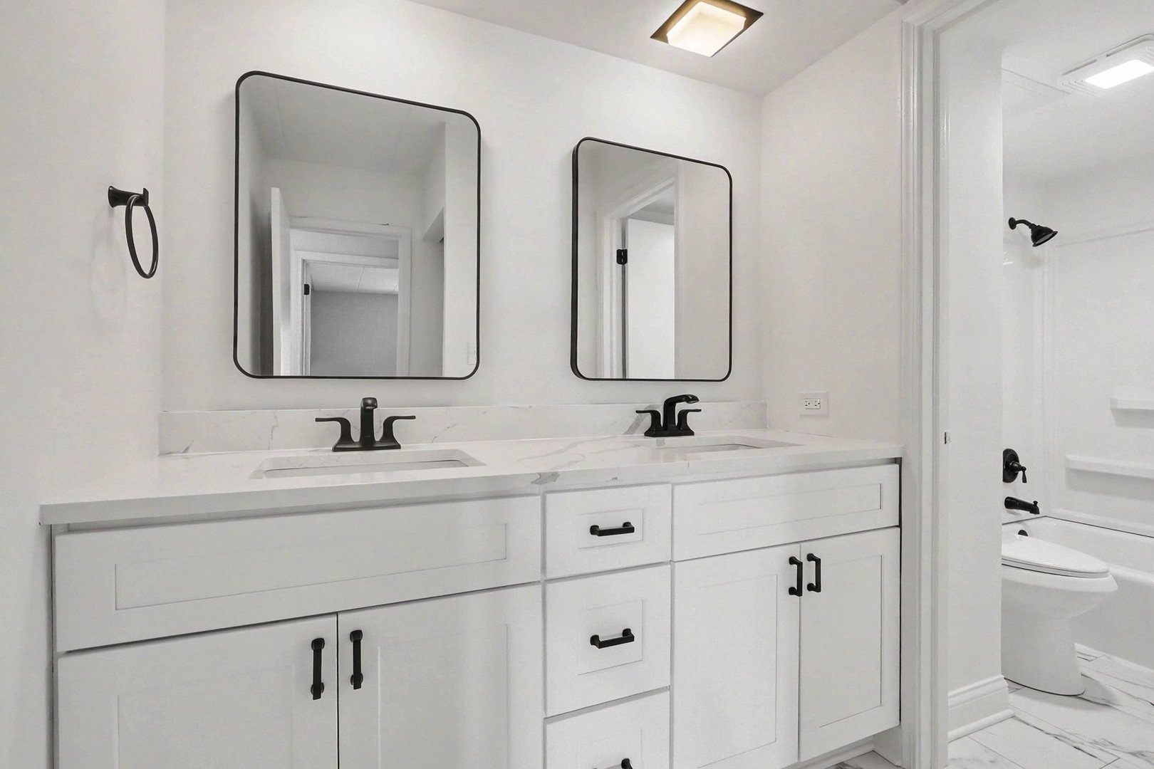 228 East Bailey Road, Unit F Naperville, IL 60565 - Photo 12 of 16 a bathroom with 2 sink and a mirror