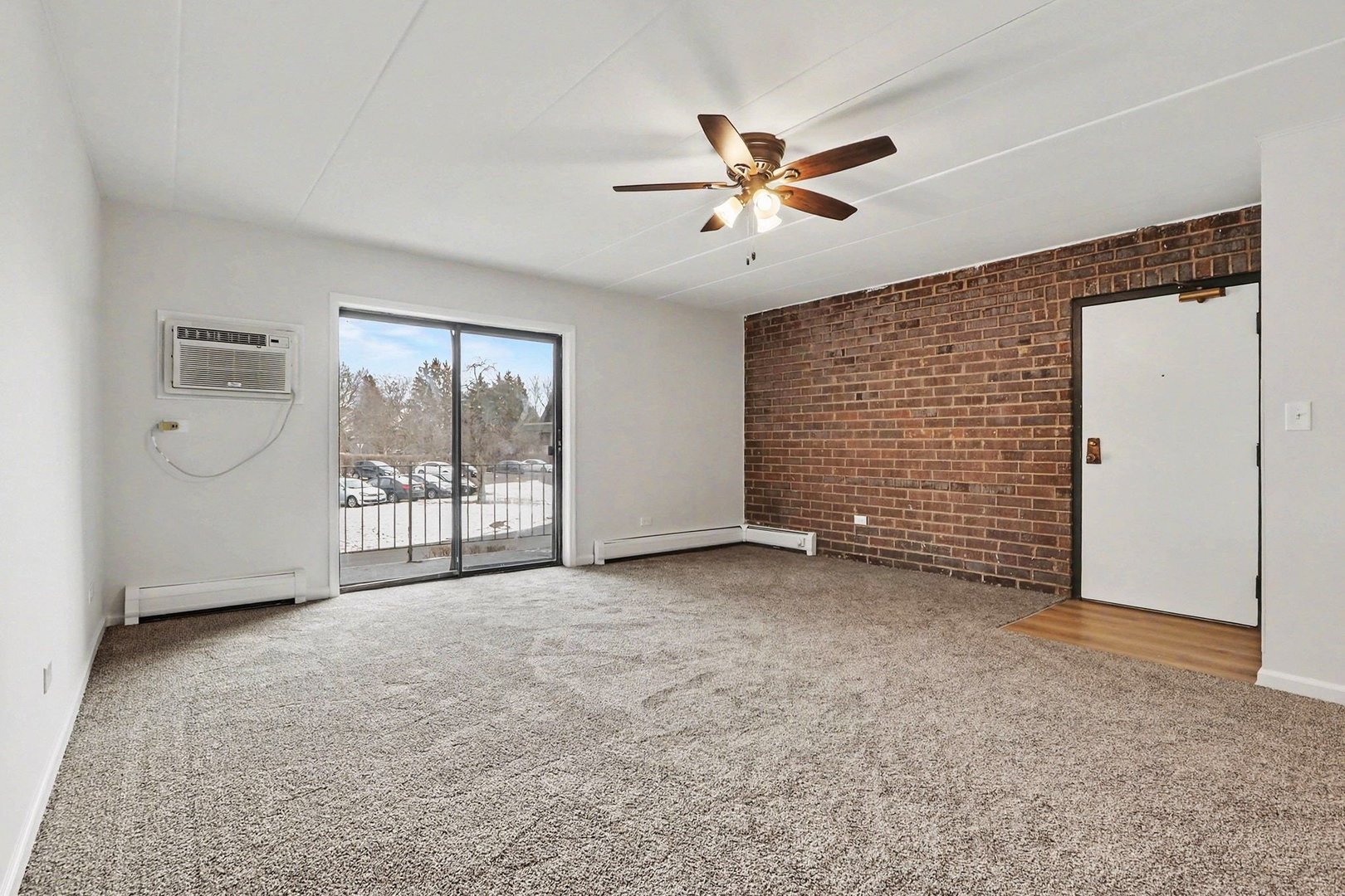 228 East Bailey Road, Unit F Naperville, IL 60565 - Photo 5 of 16 a view of an empty room with a window