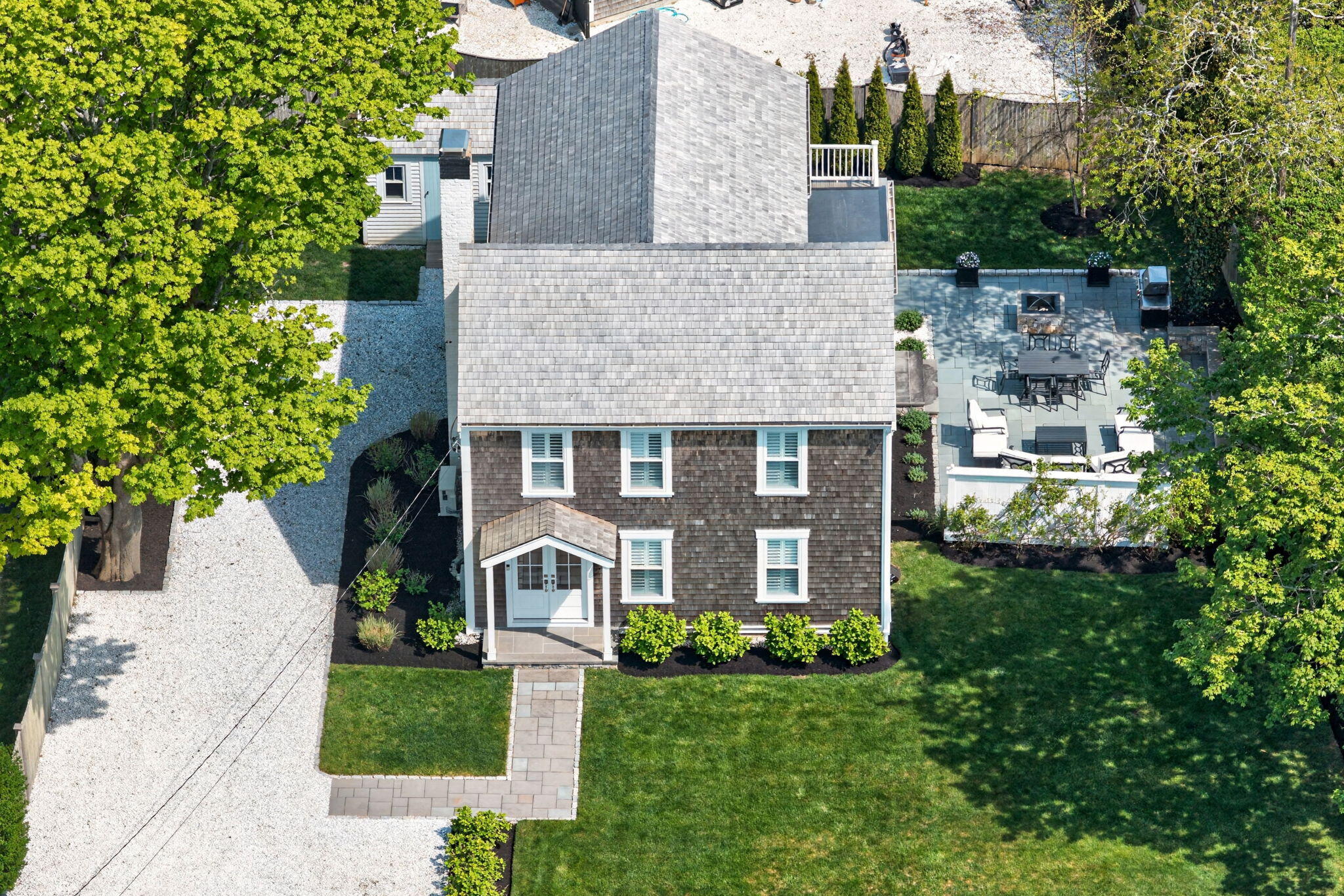 320 Old Harbor Road Chatham, MA 02633 - Photo 4 of 58 front view of a house with a yard