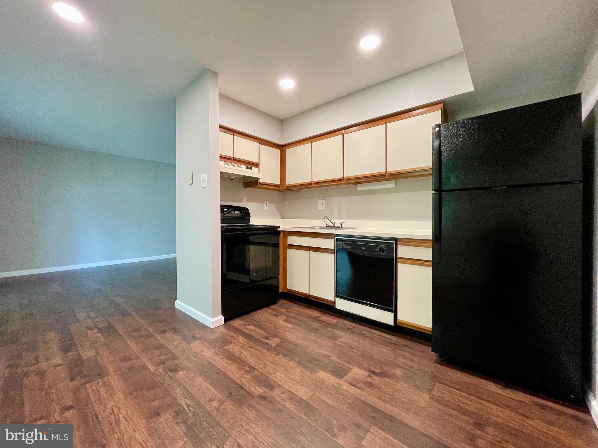 21 Shannon Road North Wales, PA 19454 - Photo 7 of 22 a kitchen with stainless steel appliances granite countertop a refrigerator and a sink