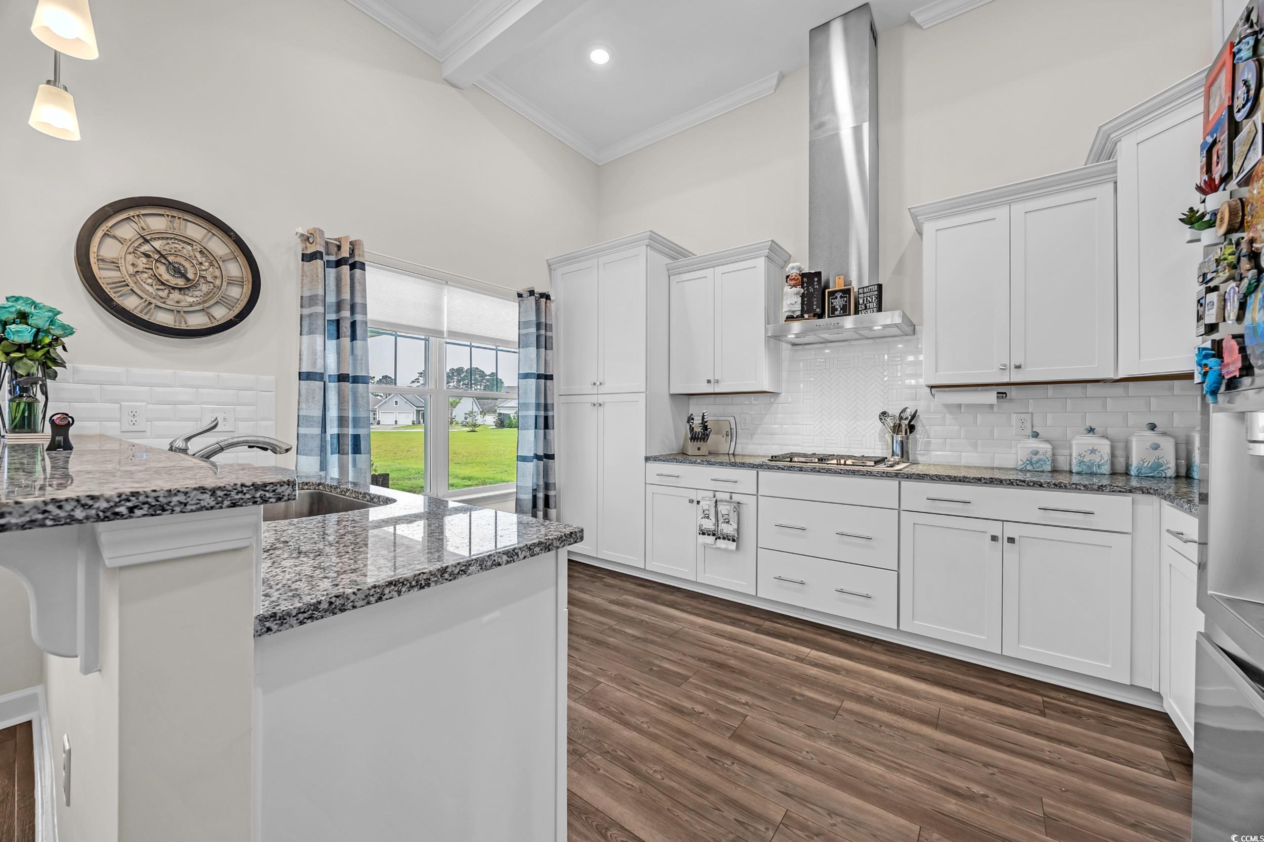116 Glengrove Lane Murrells Inlet, SC 29576 - Photo 13 of 28 Living area with ceiling fan, a fireplace, vaulted ceiling, and healthy amount of natural light