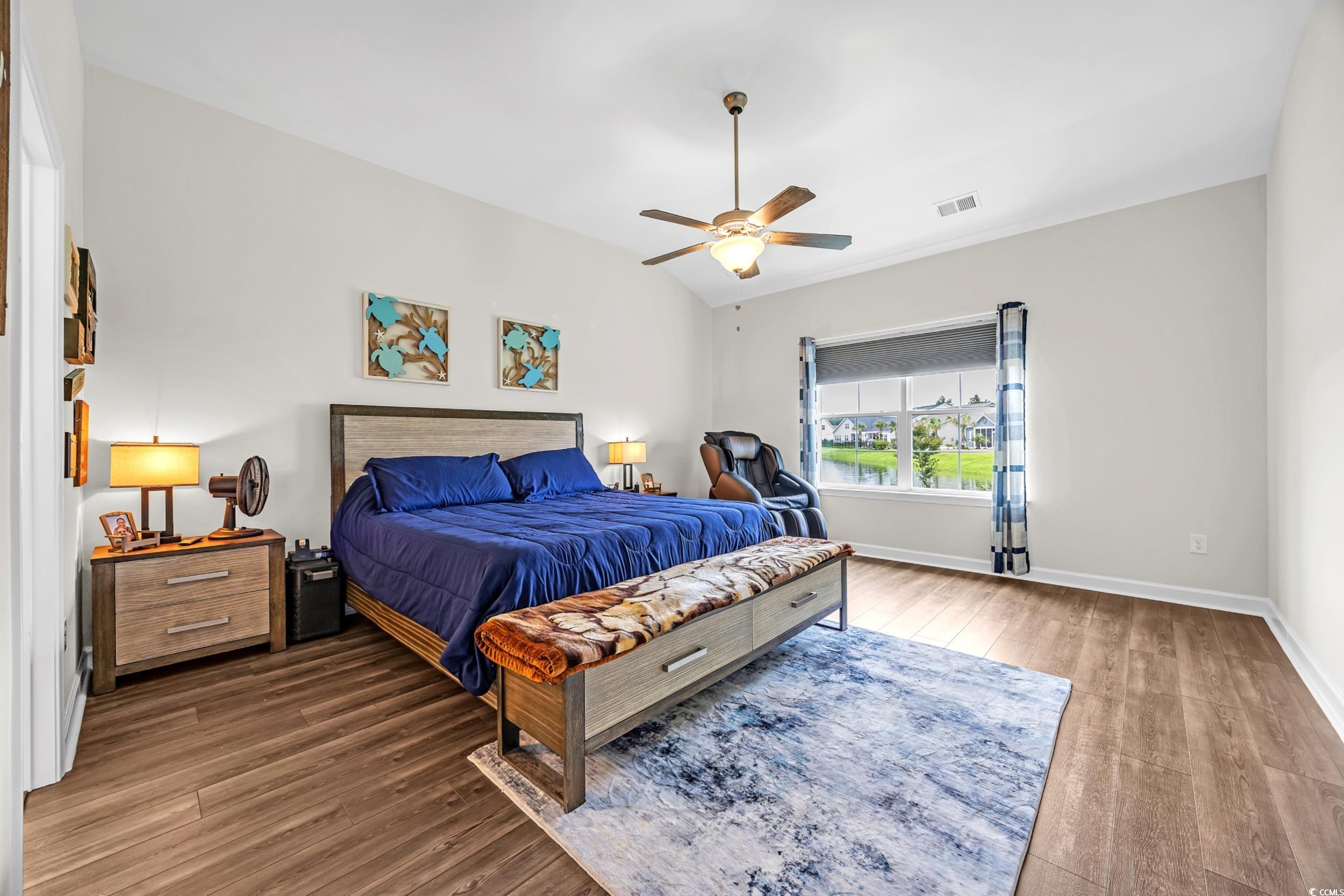 116 Glengrove Lane Murrells Inlet, SC 29576 - Photo 16 of 28 Patio view of terrace with an outdoor stone fireplace and ceiling fan.