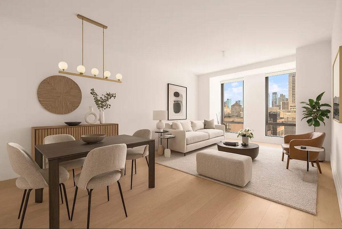 50 West 66th Street, Unit 7G Manhattan, NY 10023 - Photo 1 of 21 a living room with furniture potted plant and a large window
