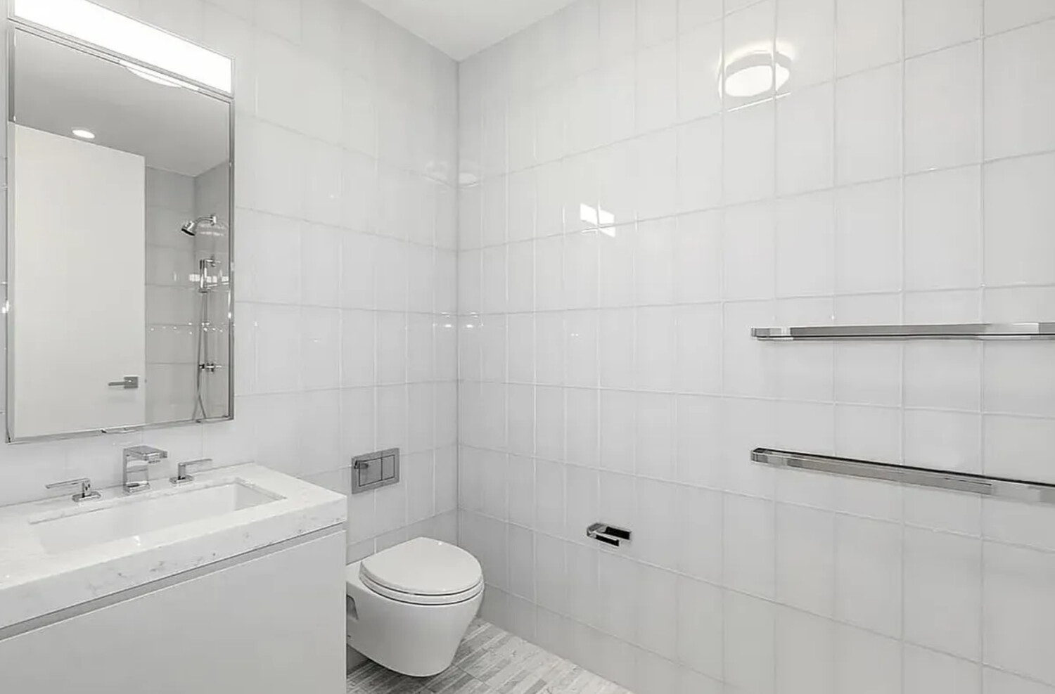 50 West 66th Street, Unit 7G Manhattan, NY 10023 - Photo 11 of 21 a bathroom with a sink toilet and shower