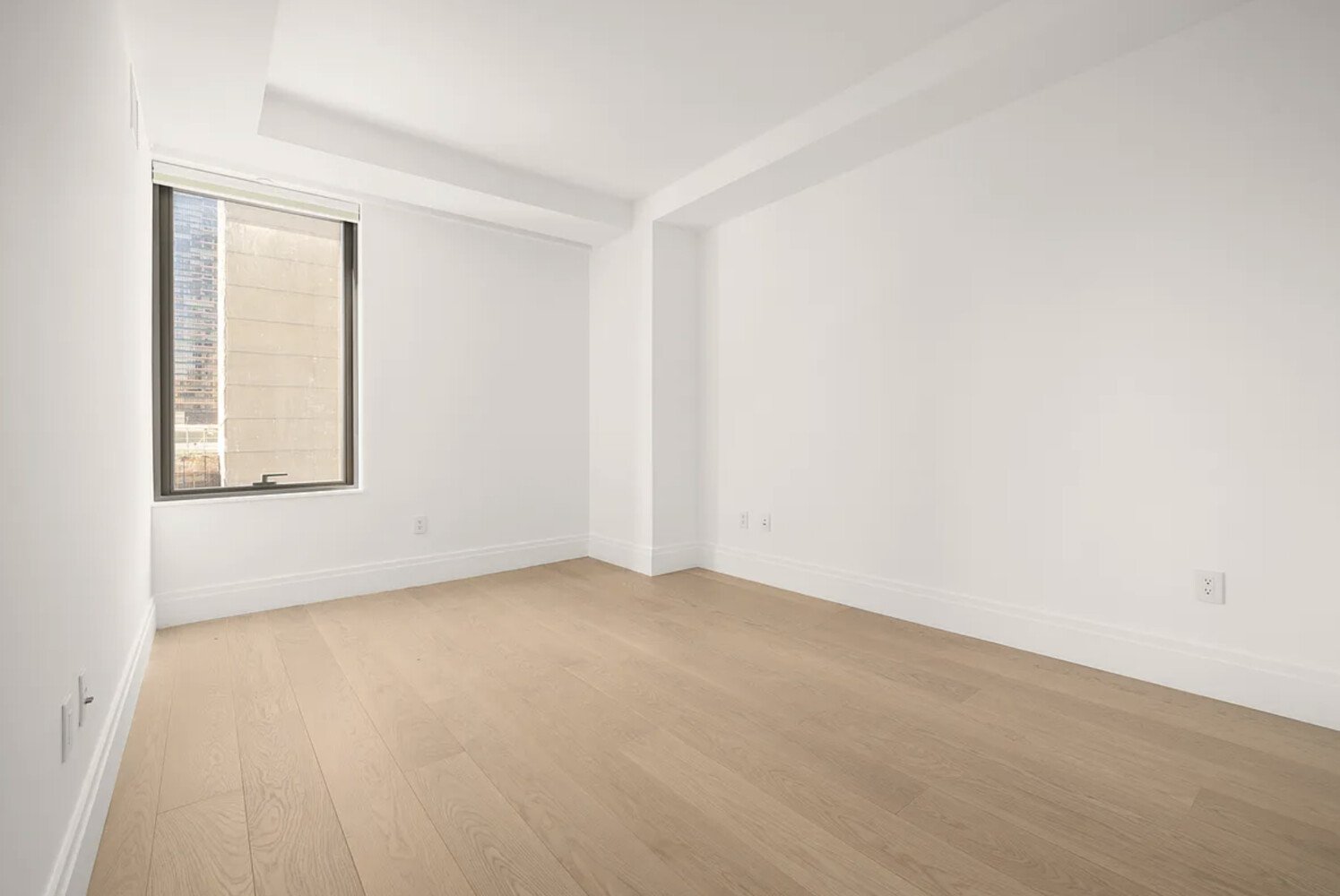 50 West 66th Street, Unit 7G Manhattan, NY 10023 - Photo 12 of 21 an empty room with windows
