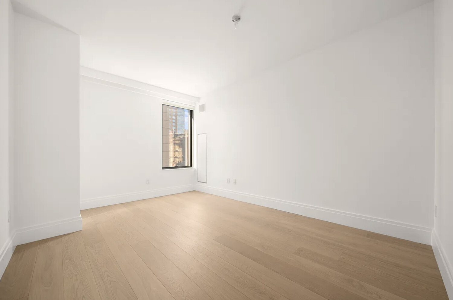 50 West 66th Street, Unit 7G Manhattan, NY 10023 - Photo 14 of 21 a view of an empty room