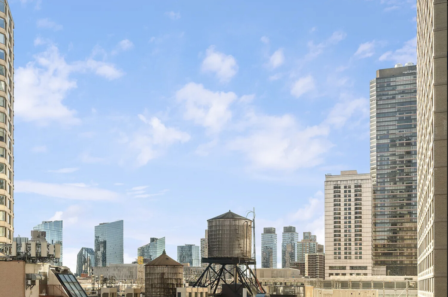 50 West 66th Street, Unit 7G Manhattan, NY 10023 - Photo 19 of 21 a view of a city with tall buildings in the background