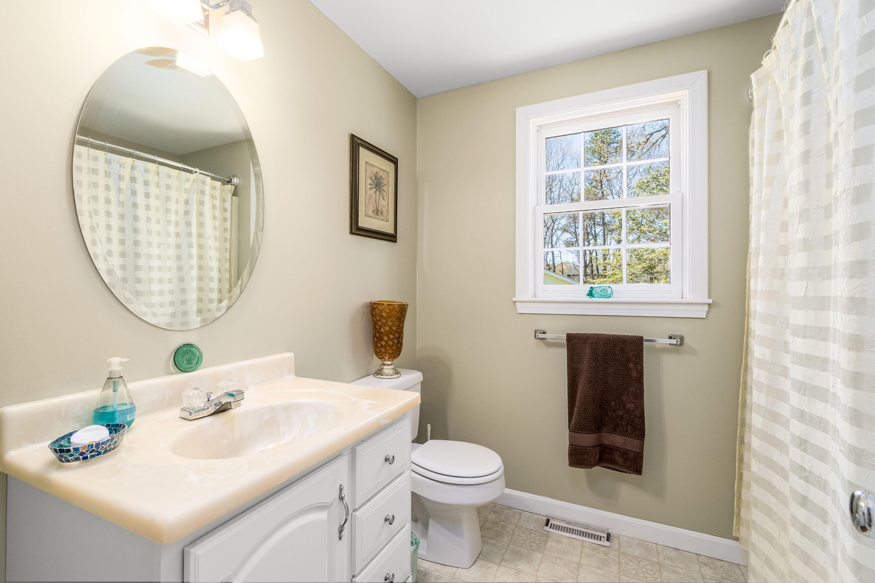 5 Raspberry Lane Marstons Mills, MA 02648 - Photo 15 of 29 a bathroom with a sink a toilet and a mirror