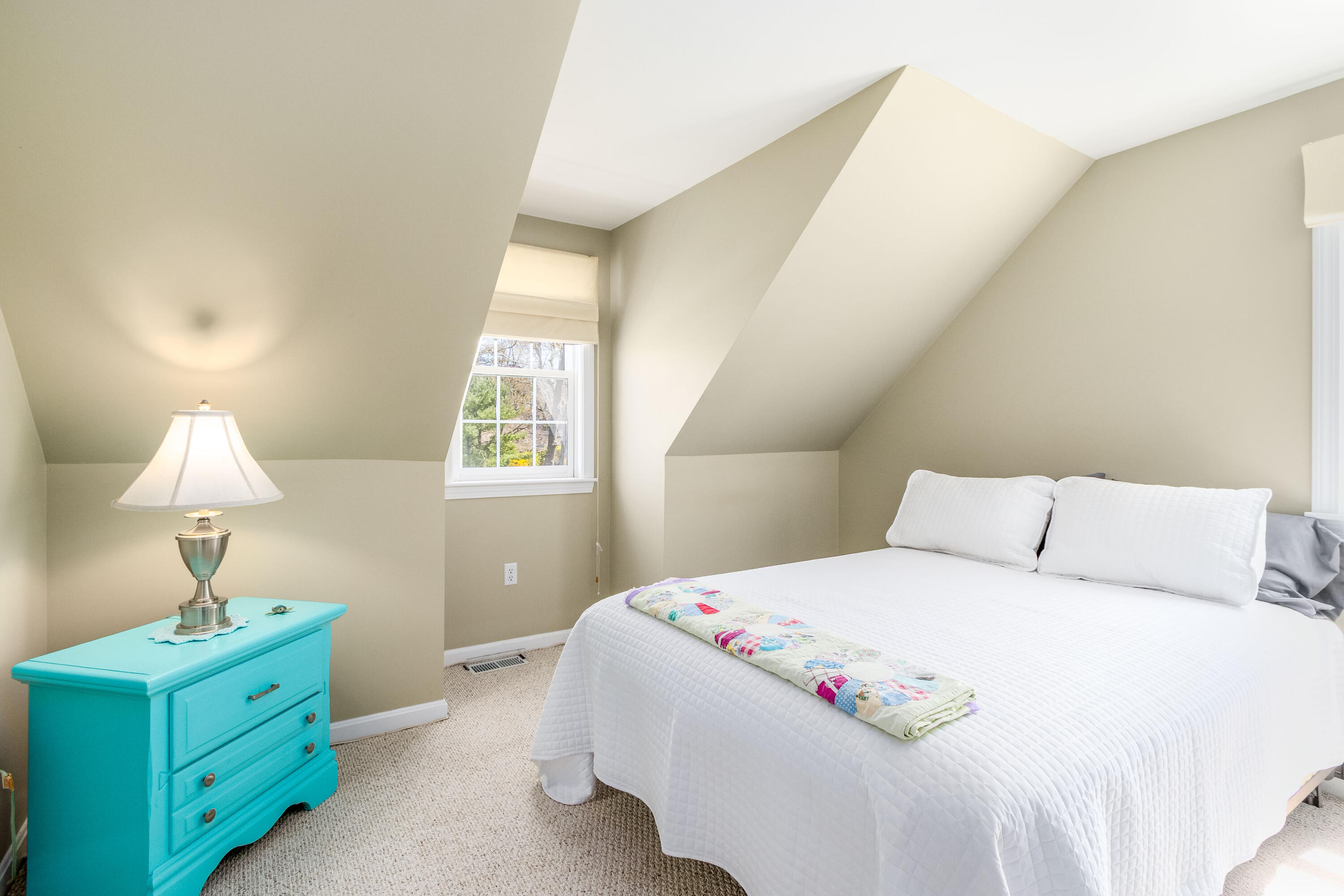 5 Raspberry Lane Marstons Mills, MA 02648 - Photo 17 of 29 a bedroom with a bed and a lamp on the dresser
