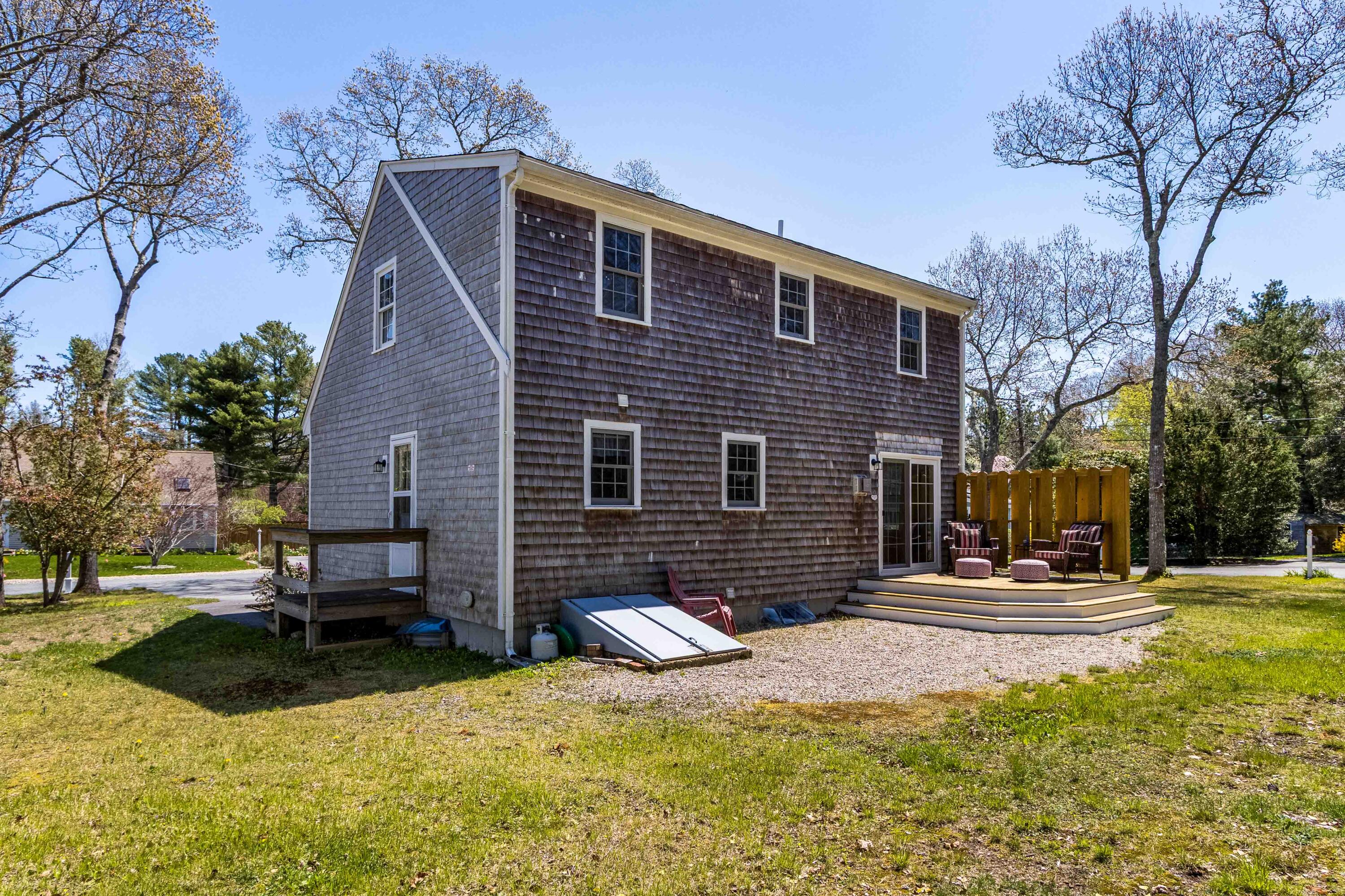 5 Raspberry Lane Marstons Mills, MA 02648 - Photo 19 of 29 a view of a house with a yard