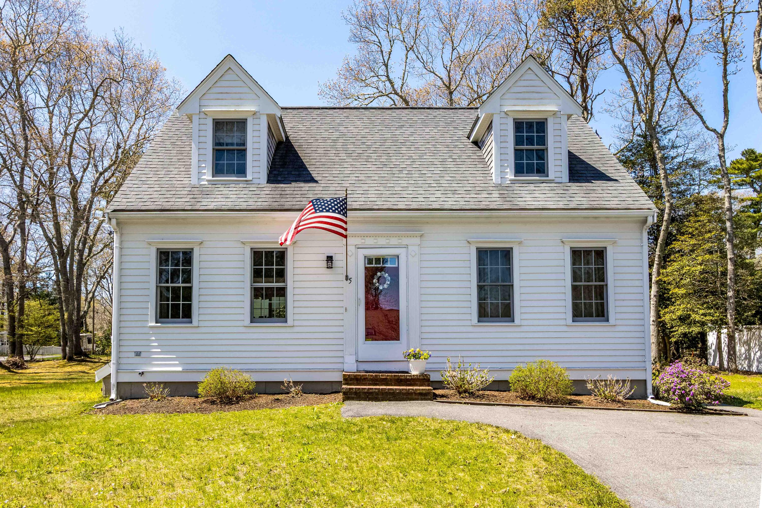 5 Raspberry Lane Marstons Mills, MA 02648 - Photo 25 of 29 a front view of a house with a yard
