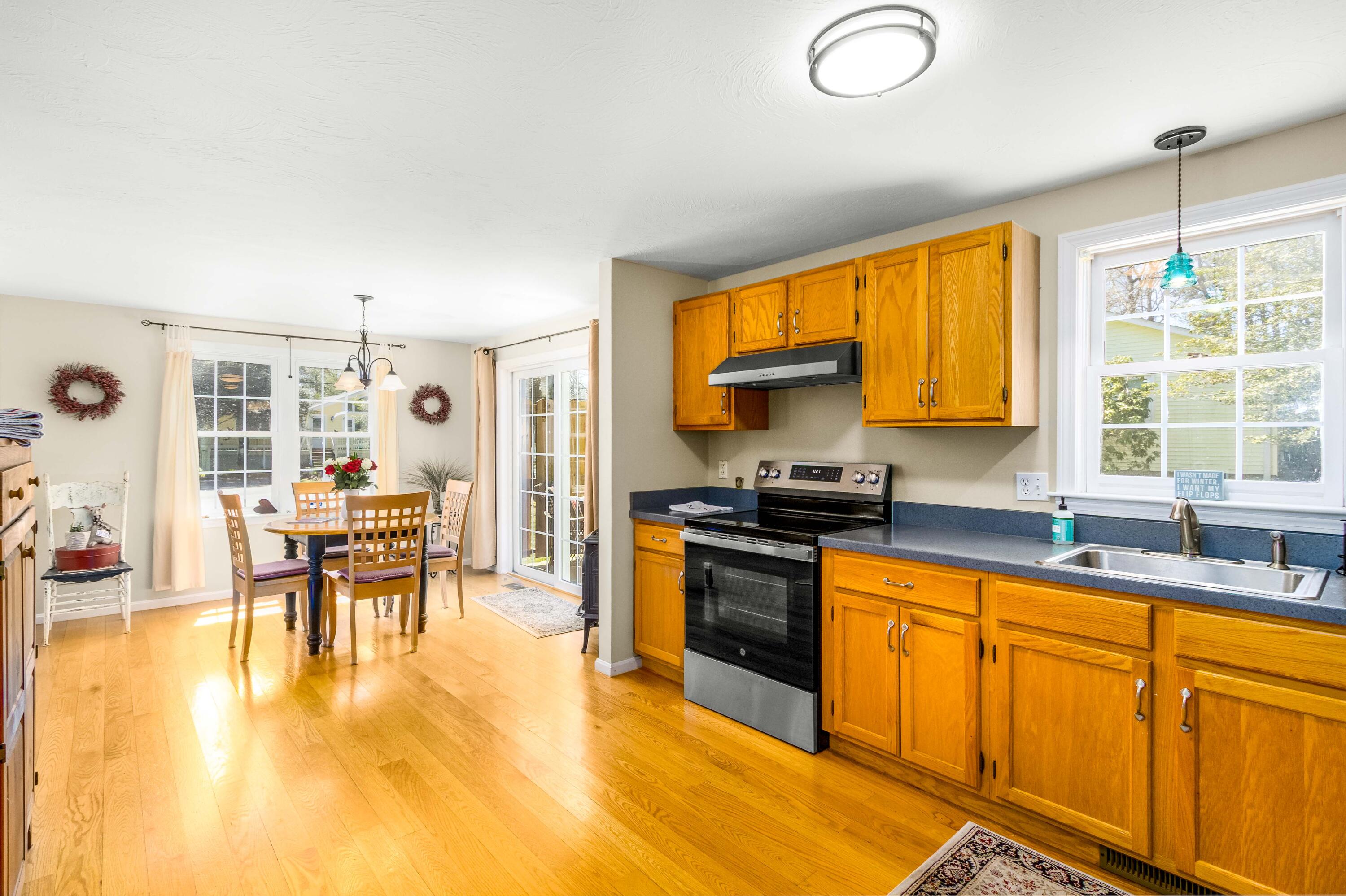 5 Raspberry Lane Marstons Mills, MA 02648 - Photo 7 of 29 a kitchen with stove and cabinets