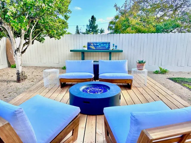 swimming pool view with a seating space