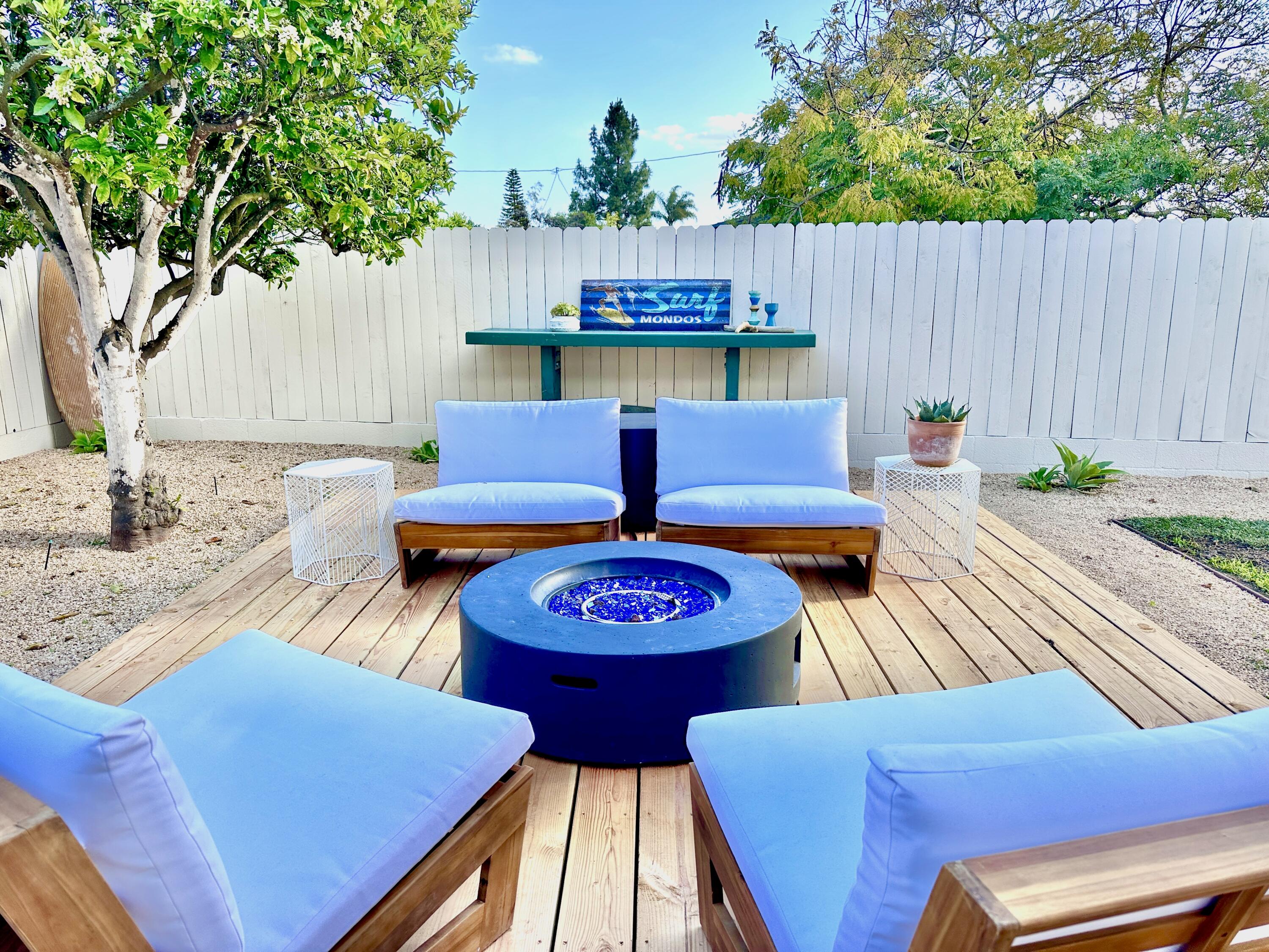 swimming pool view with a seating space
