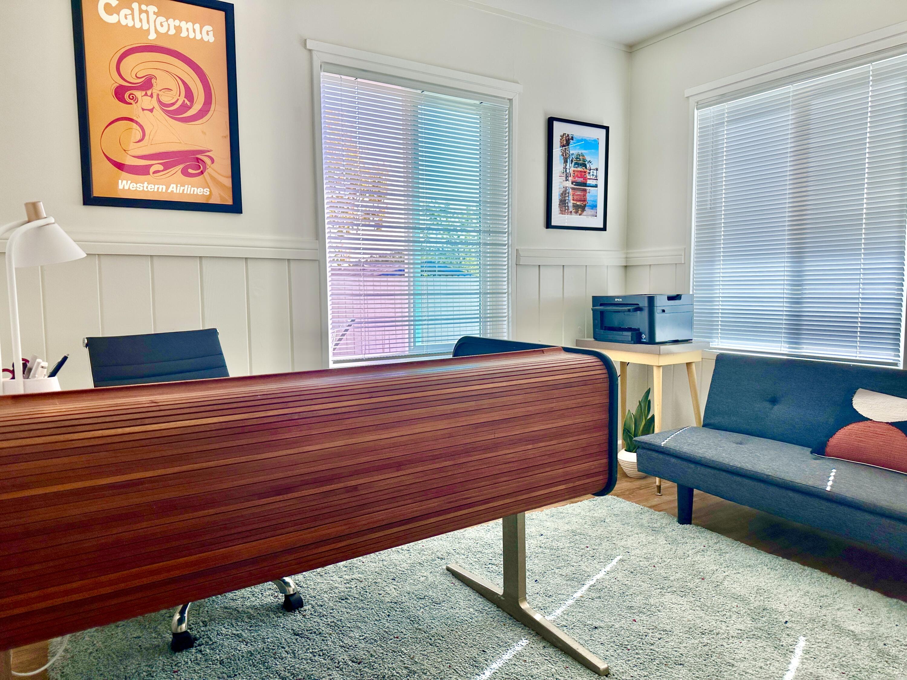 2227 Cliff Drive Santa Barbara, CA 93109 - Photo 18 of 26 a bedroom with a bed and a couch