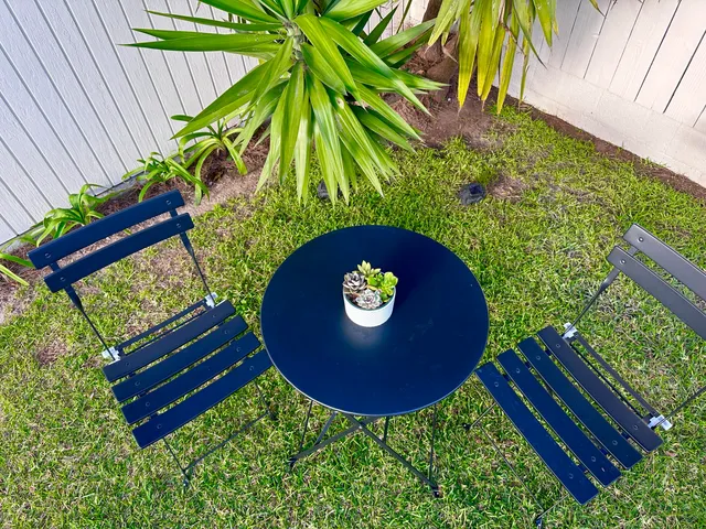 a view of a back yard of the house