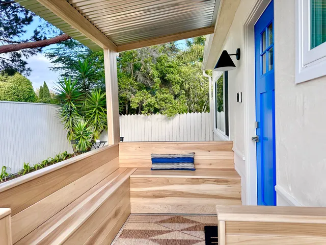 a view of wooden door with glass door