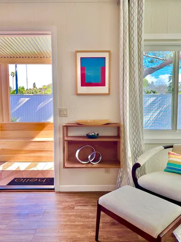 a view of a livingroom with furniture and window
