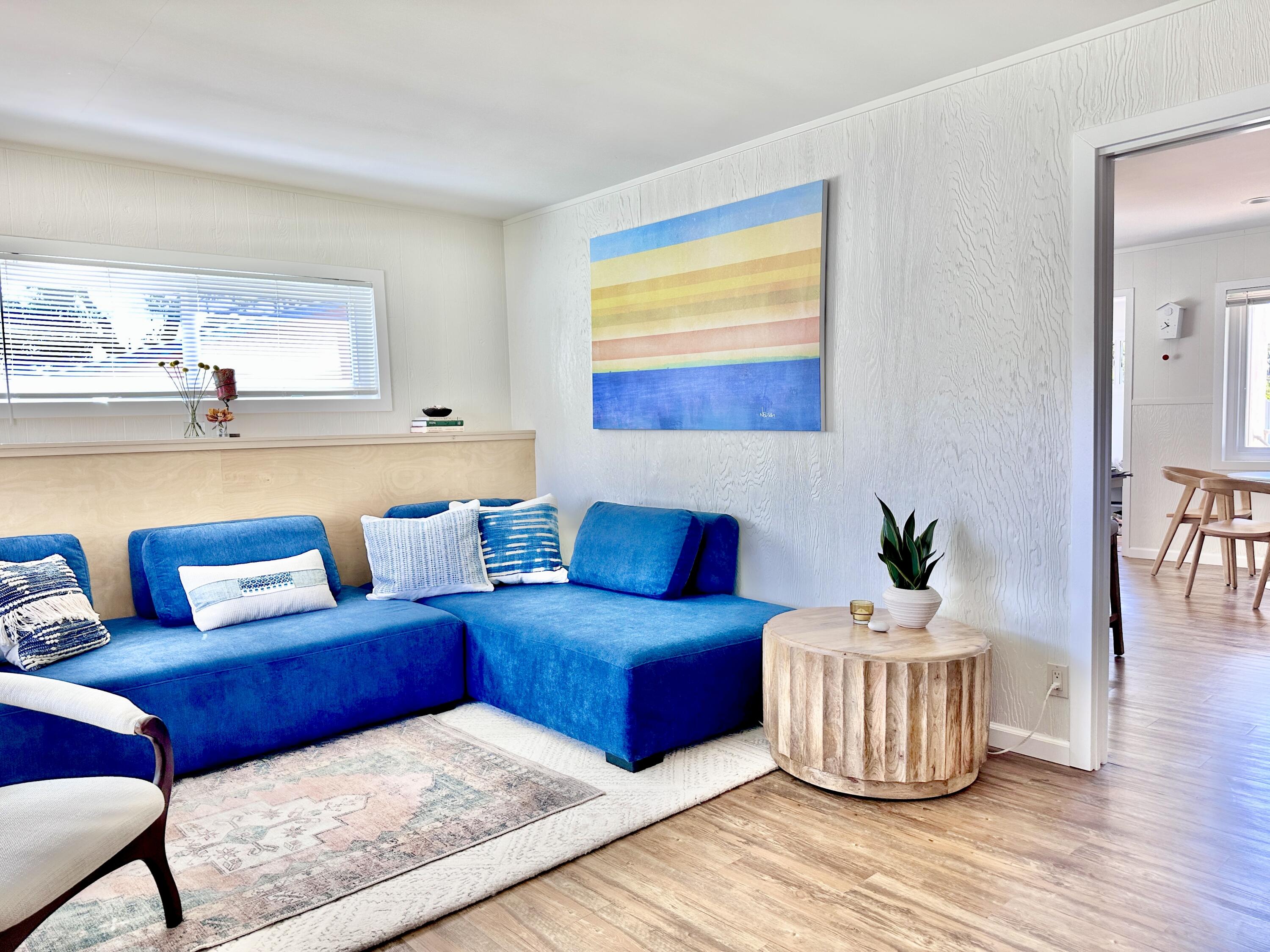 2227 Cliff Drive Santa Barbara, CA 93109 - Photo 7 of 26 a living room with furniture and wooden floor
