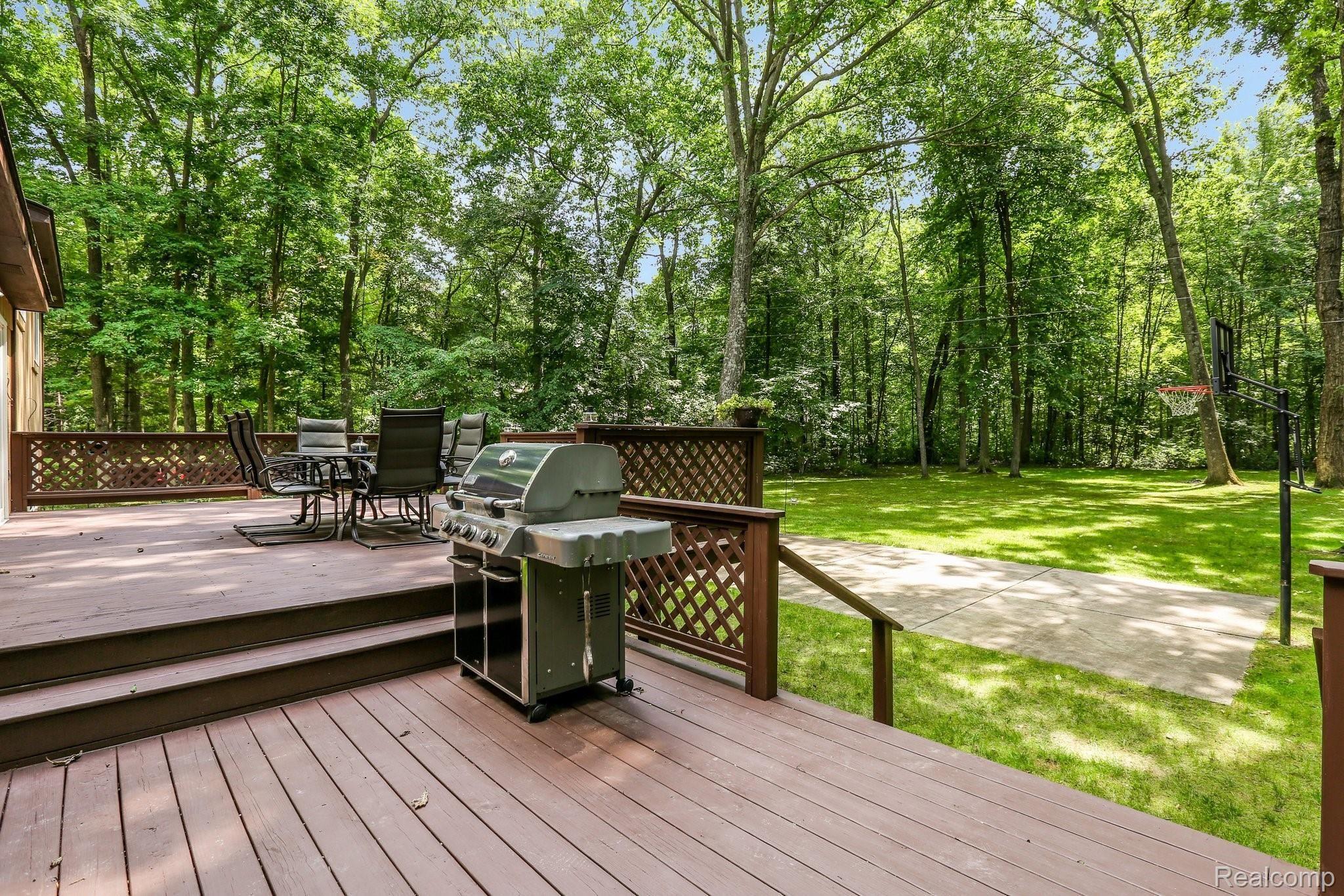 5118 Golf Club Road Howell, MI 48843 - Photo 29 of 40 Two tiered deck