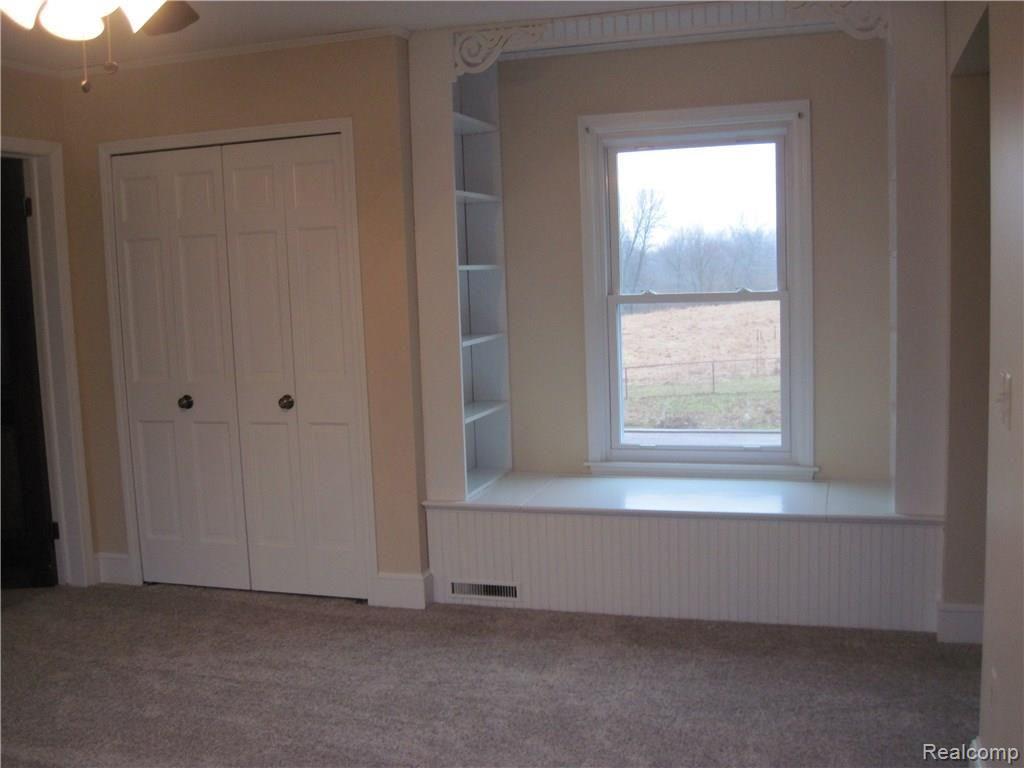60 West Sutton Road Metamora, MI 48455 - Photo 30 of 39 Master Bedroom with window seat storage
