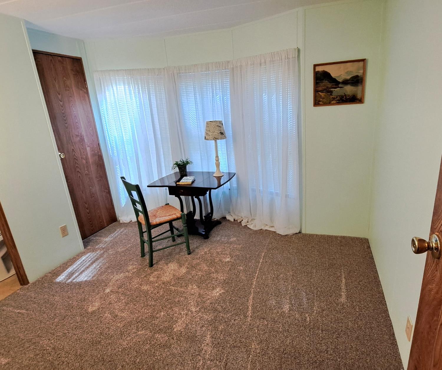 5766 Pony Express Trail, Unit 4 Pollock Pines, CA 95726 - Photo 9 of 17 a workspace with furniture and window